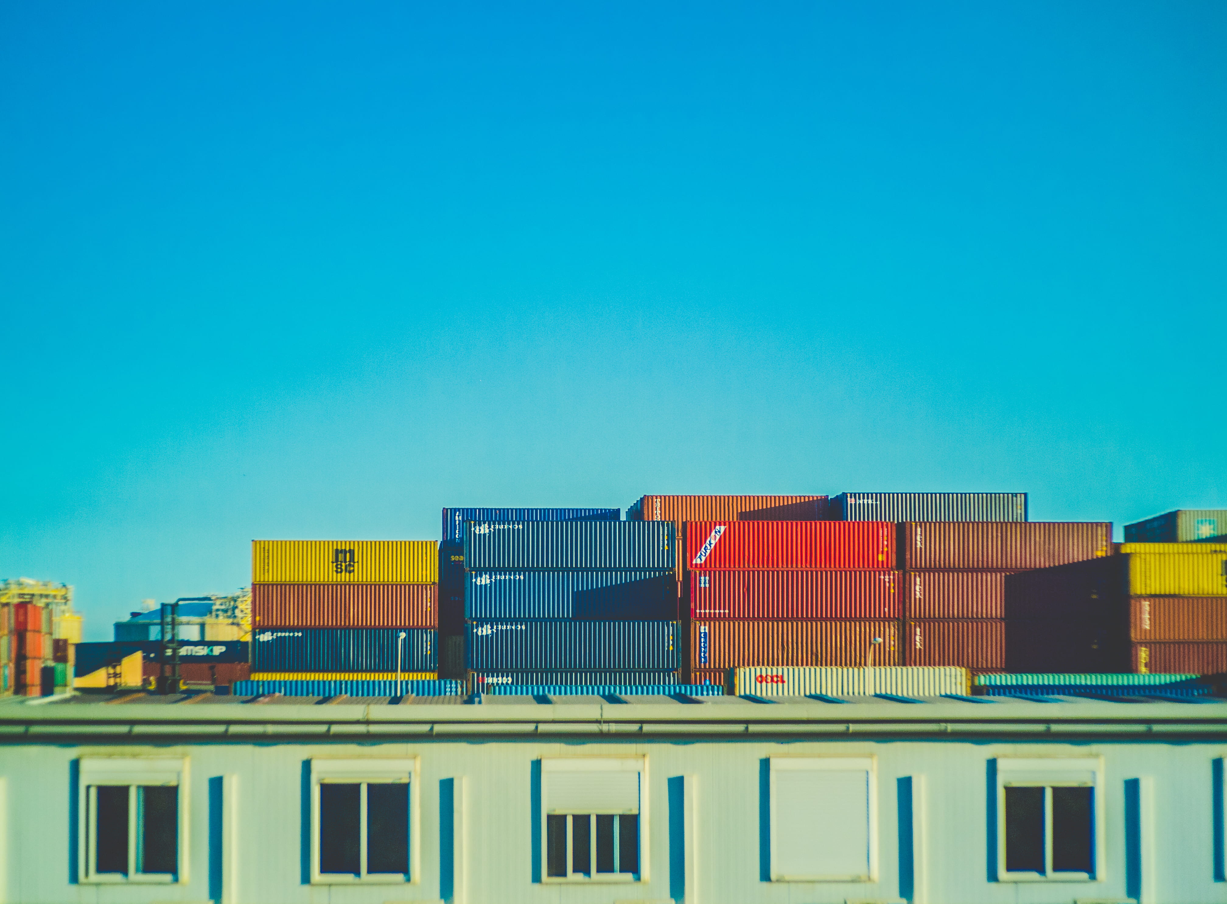 built structure, cargo, building exterior, color, copy space, building, no people, sunlight, clear sky, docks, 4K, window, assorted, cargo container, city, HD Wallpaper
