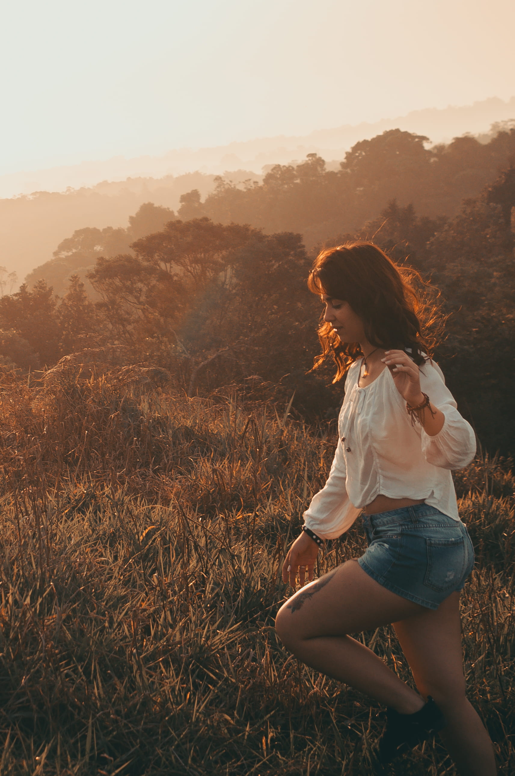 taken, trees, nature, casual clothing, adult, fashion, young adult, sunset, blue, short, sitting, one person, smiling, contemplation, three quarter length, Phone HD Wallpaper