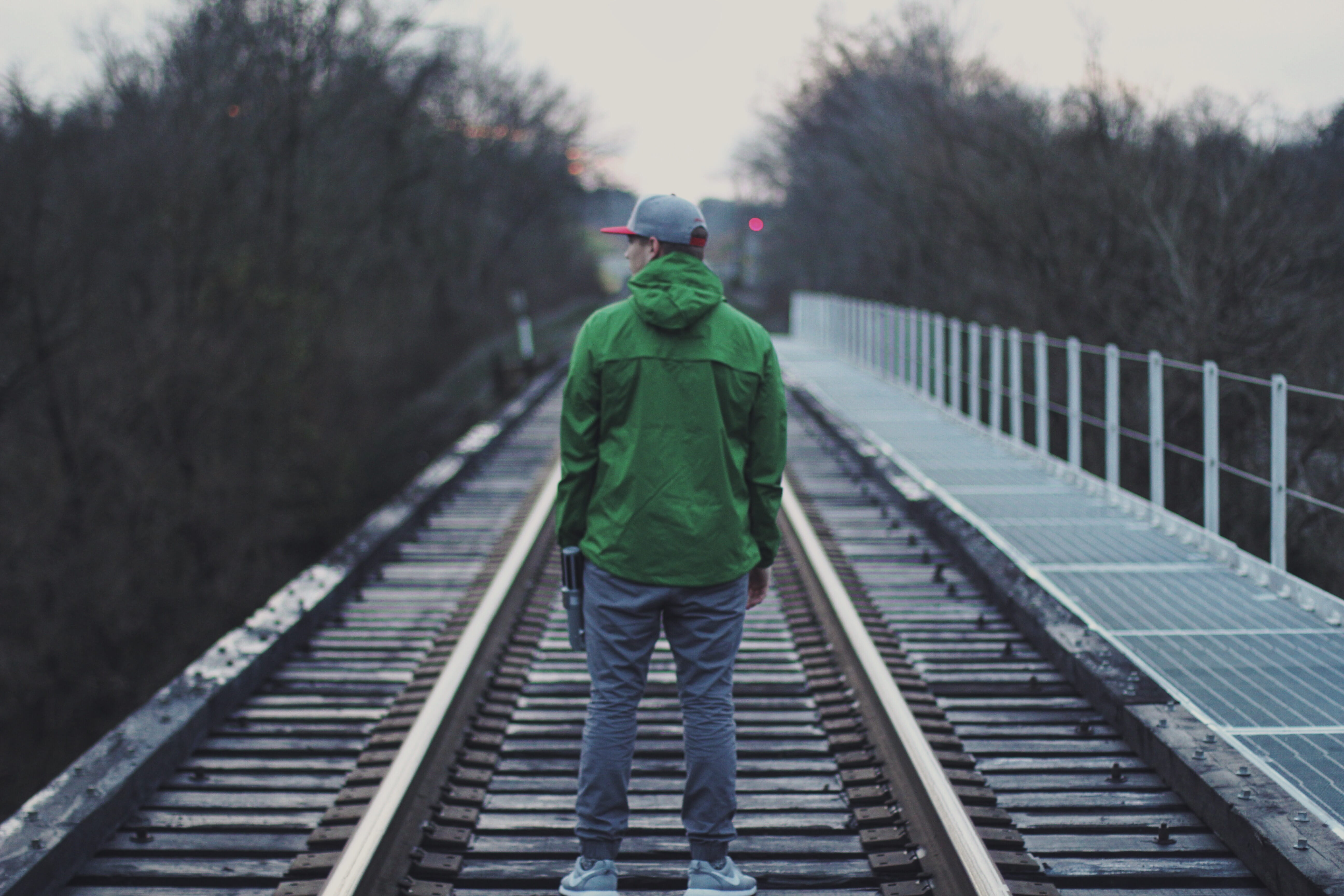 train, lifestyles, transportation, direction, full length, rail transportation, real people, walking, railroad track, men, track, trees, green color, rear view, HD Wallpaper