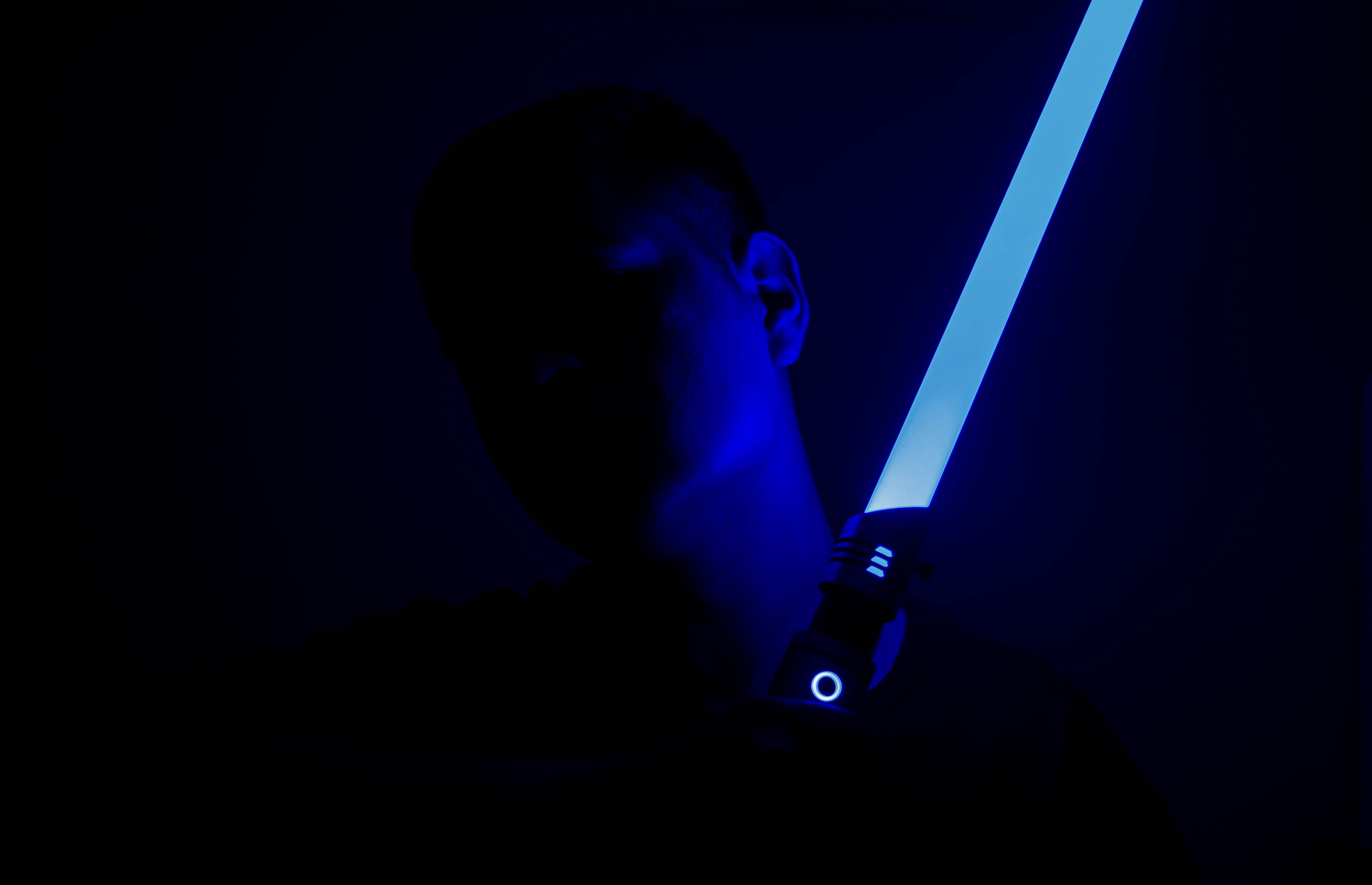 warning sign, lightsaber, security, male, aggression, illuminated, dark blue, dark, silhouette, man, lighting equipment, person, social issues, sign, crime, HD Wallpaper
