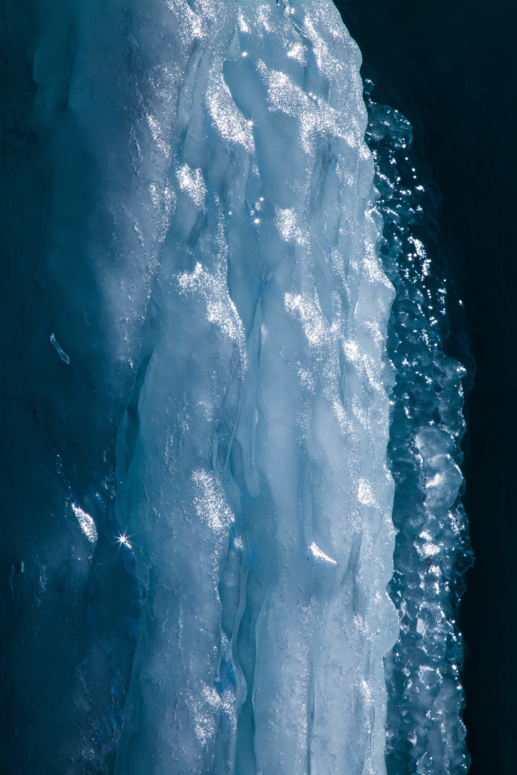 frozen, close-up, 2K, snow, sunlight, outdoors, power in nature, day, white color, ice, blue, water, beauty in nature, waterfront, icefall, winter, melting, Phone HD Wallpaper