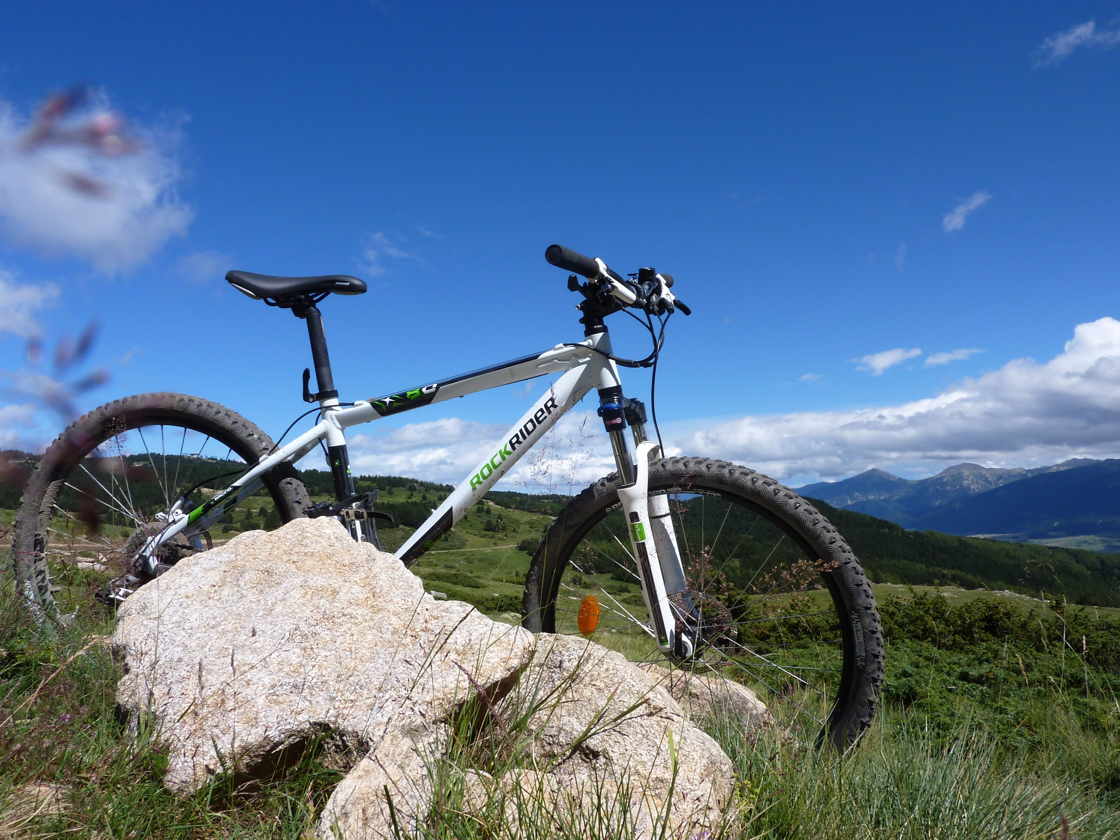 white, cloud - sky, non-urban scene, Mountain Biking, land vehicle, mode of transportation, 2K, rock, day, landscape, outdoors, Pyrenees, near, wheel, HD Wallpaper