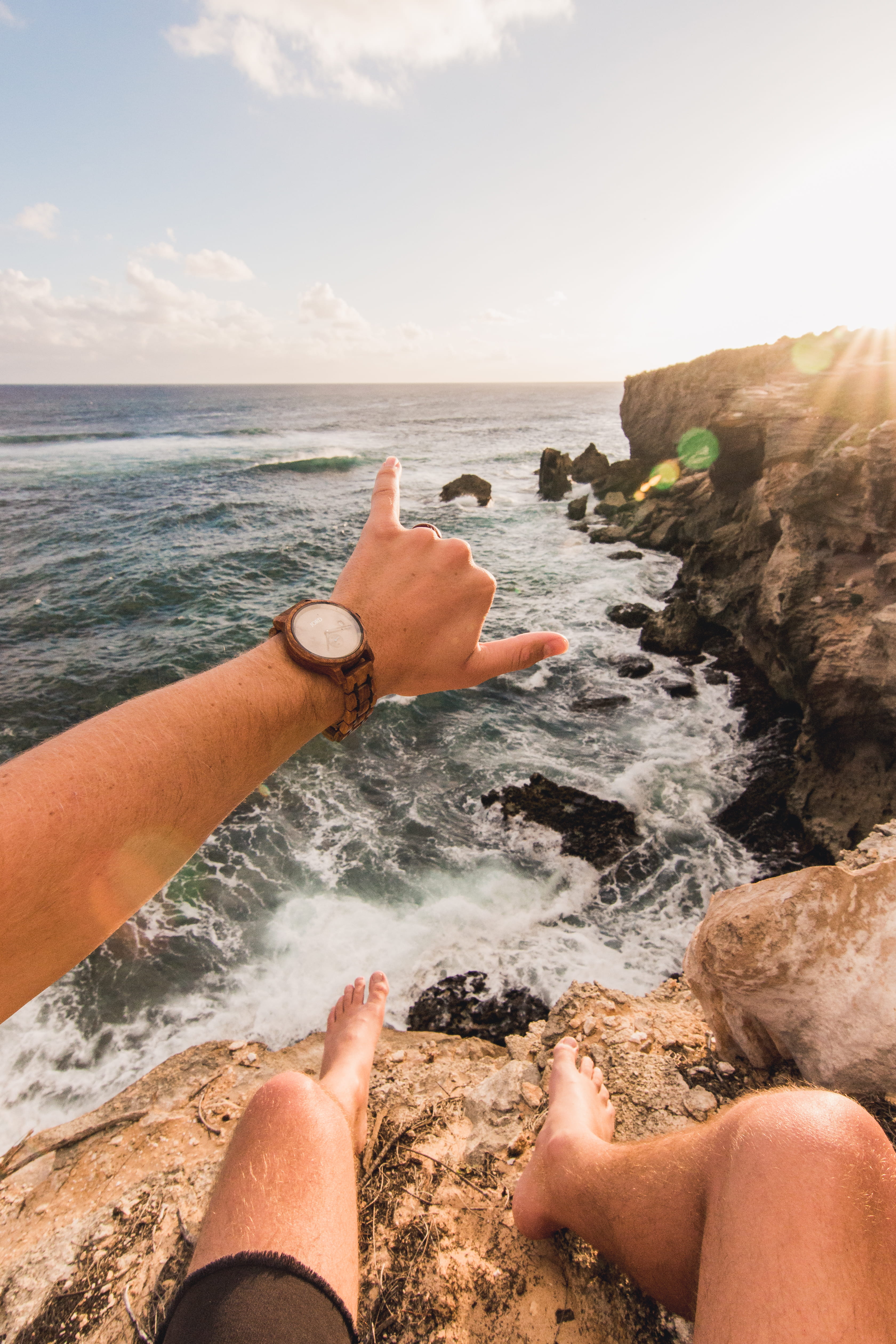 gesture, sky, beside, body part, live life, finger, real people, feet, rock, beach, horn, couple - relationship, personal perspective, land, sea, horizon over water, Phone HD Wallpaper