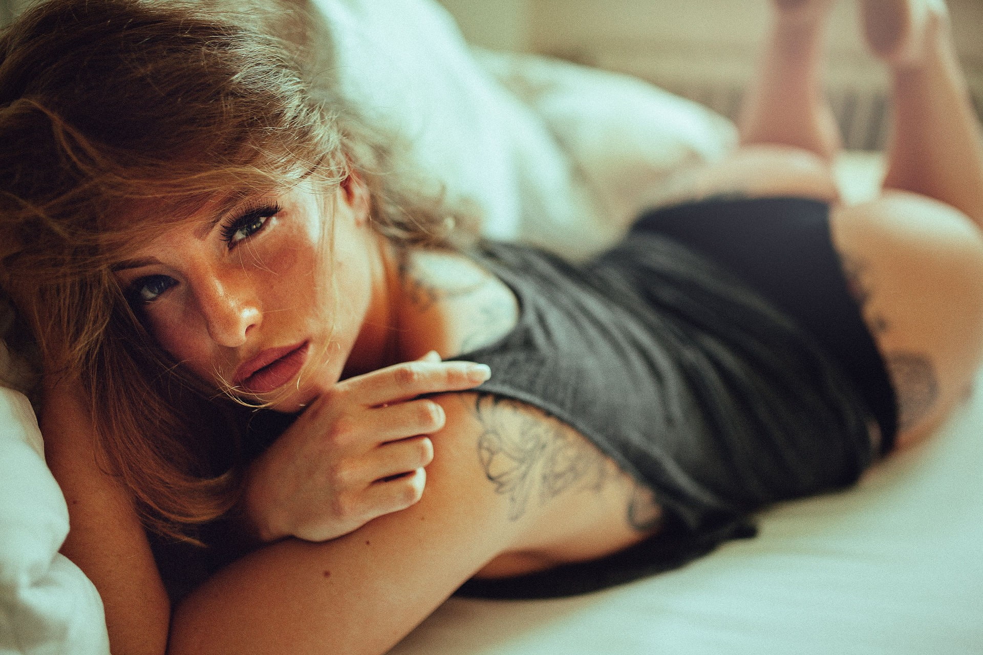 looking at viewer, 1080P, black tops, model, black panties, lying on front, André Josselin, women, brunette, tattoo, HD Wallpaper