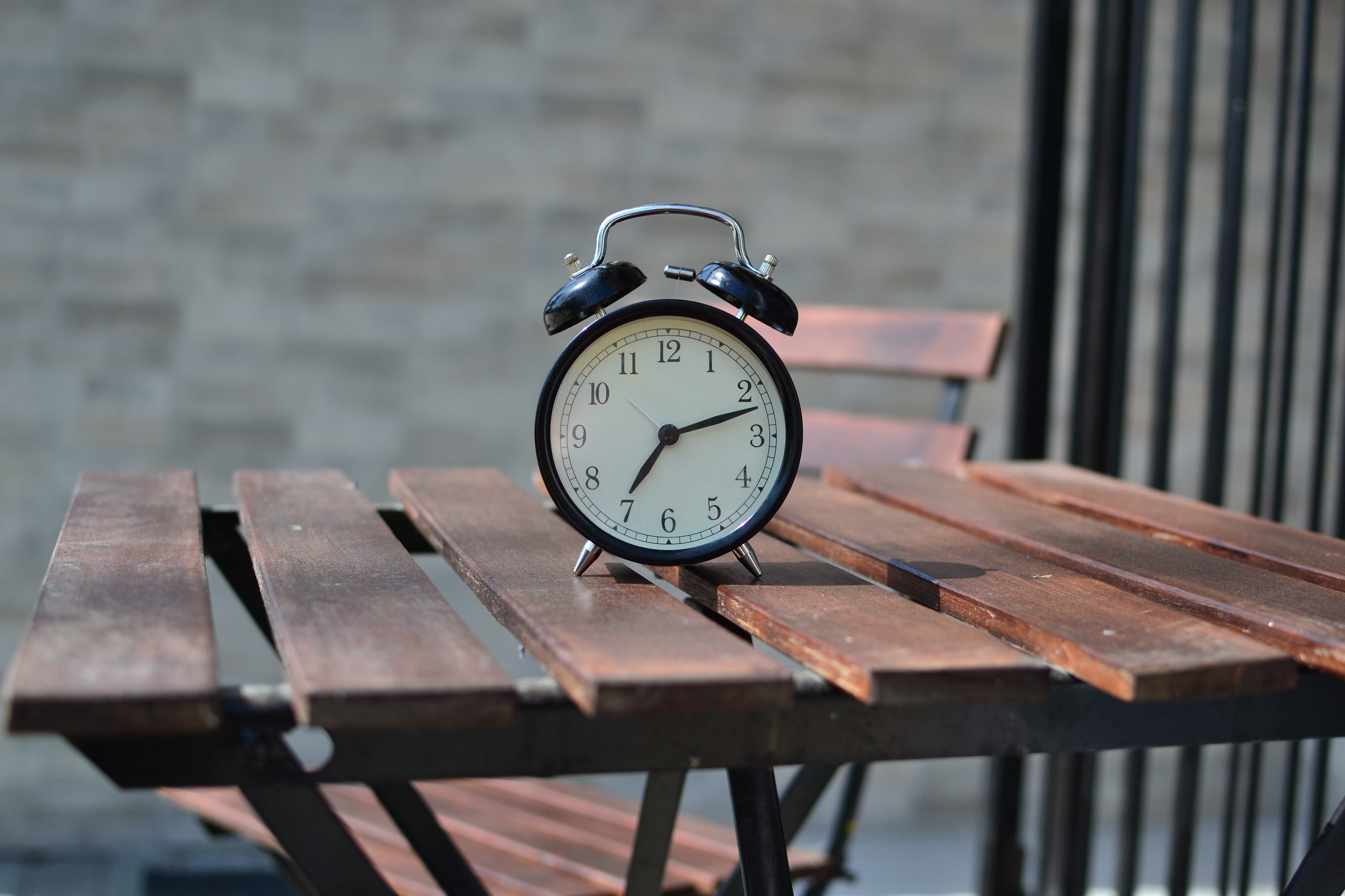 brown, chair, alarm clock, wood - material, top, brick wall, communication, day, focus, seat, no people, black, time, selective, focus on foreground, photography, HD Wallpaper