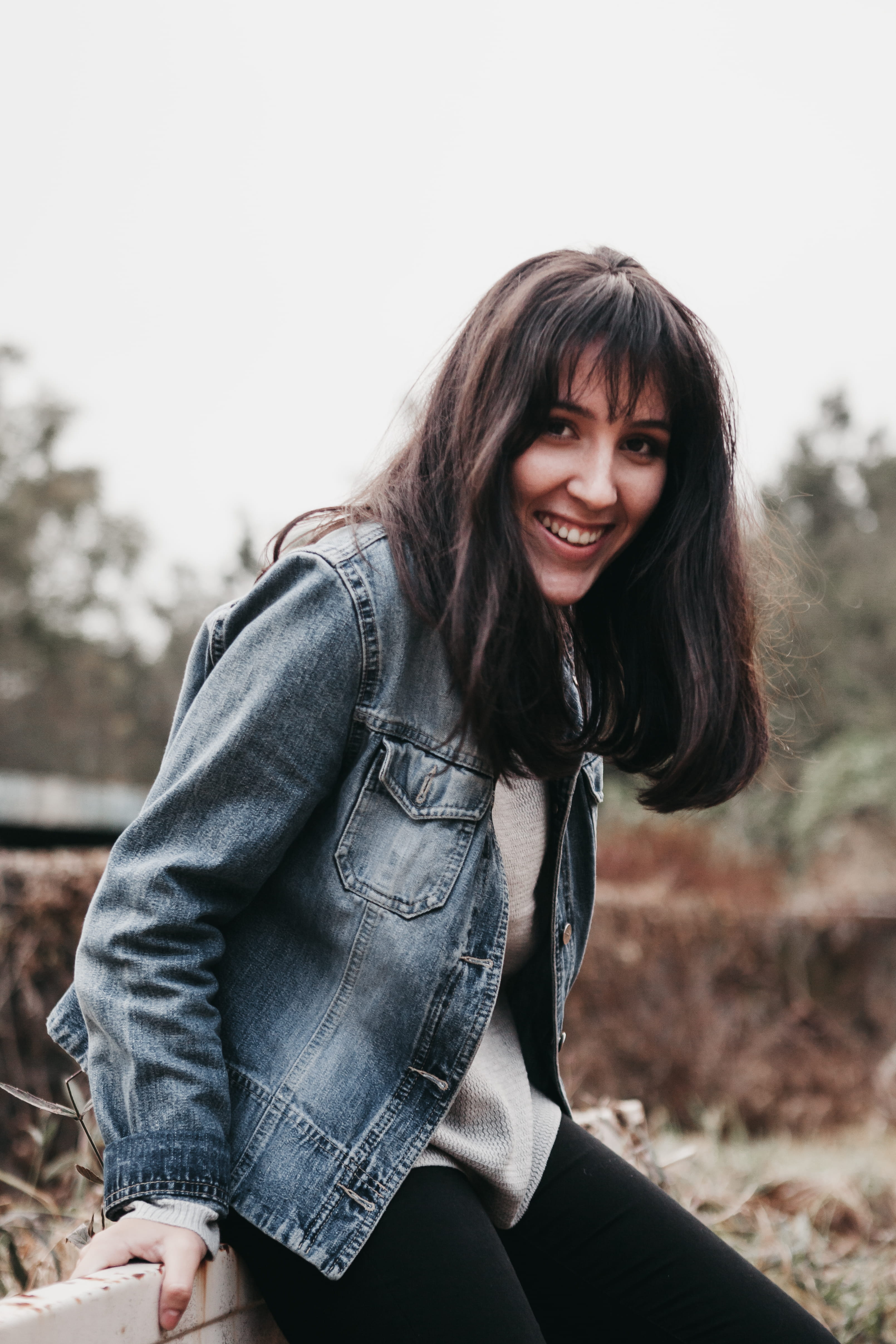 face, 4K, wearing, smiling, la plaine des cafres, long hair, three quarter length, sitting, human, réunion, young adult, jacket, hairstyle, chambray, coat, Phone HD Wallpaper