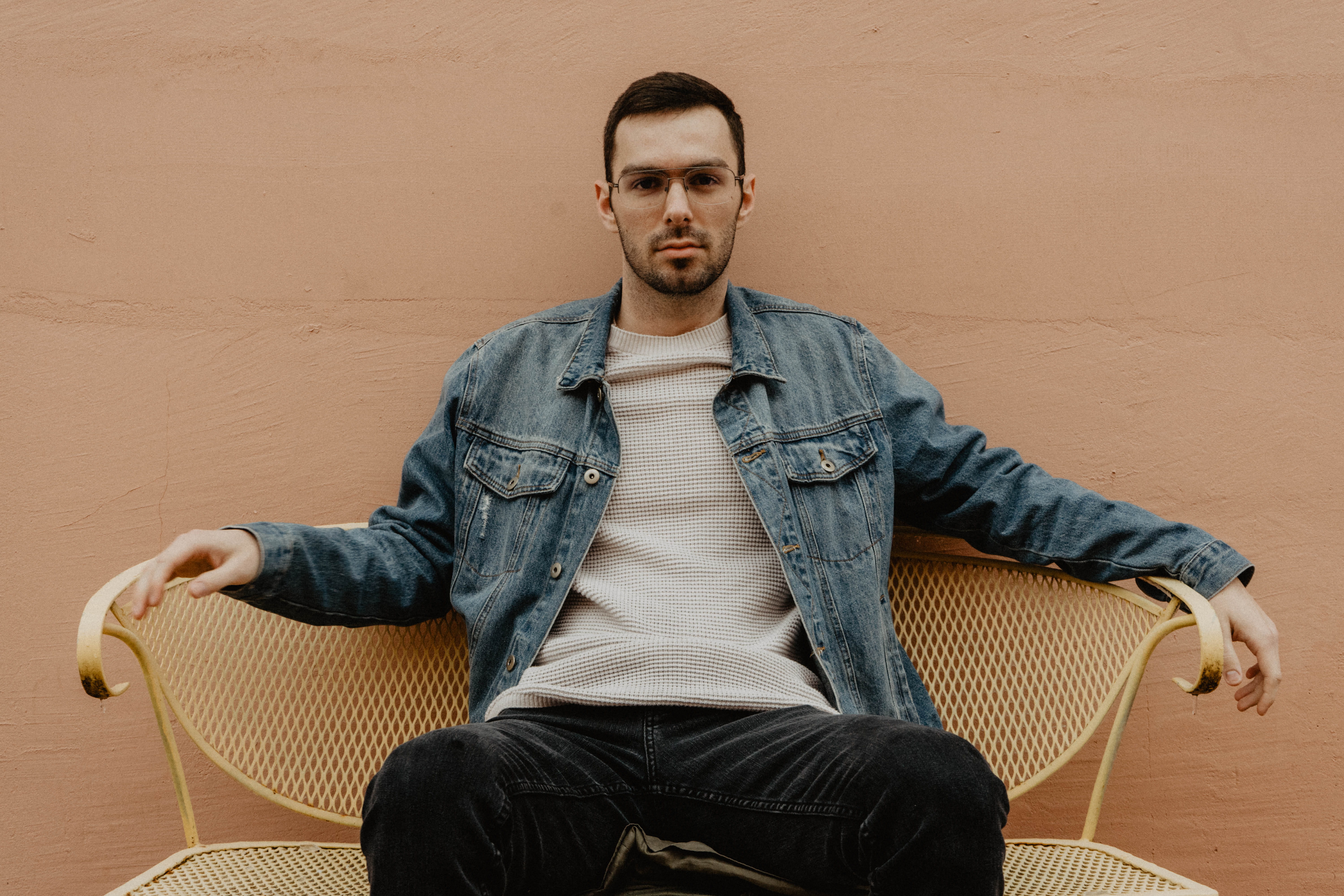 person, portrait, wearing, jacket, steel, bench, 5K, seat, blue, yellow, relaxation, man, indoors, chair, chambray, three quarter length, metal, adult, HD Wallpaper