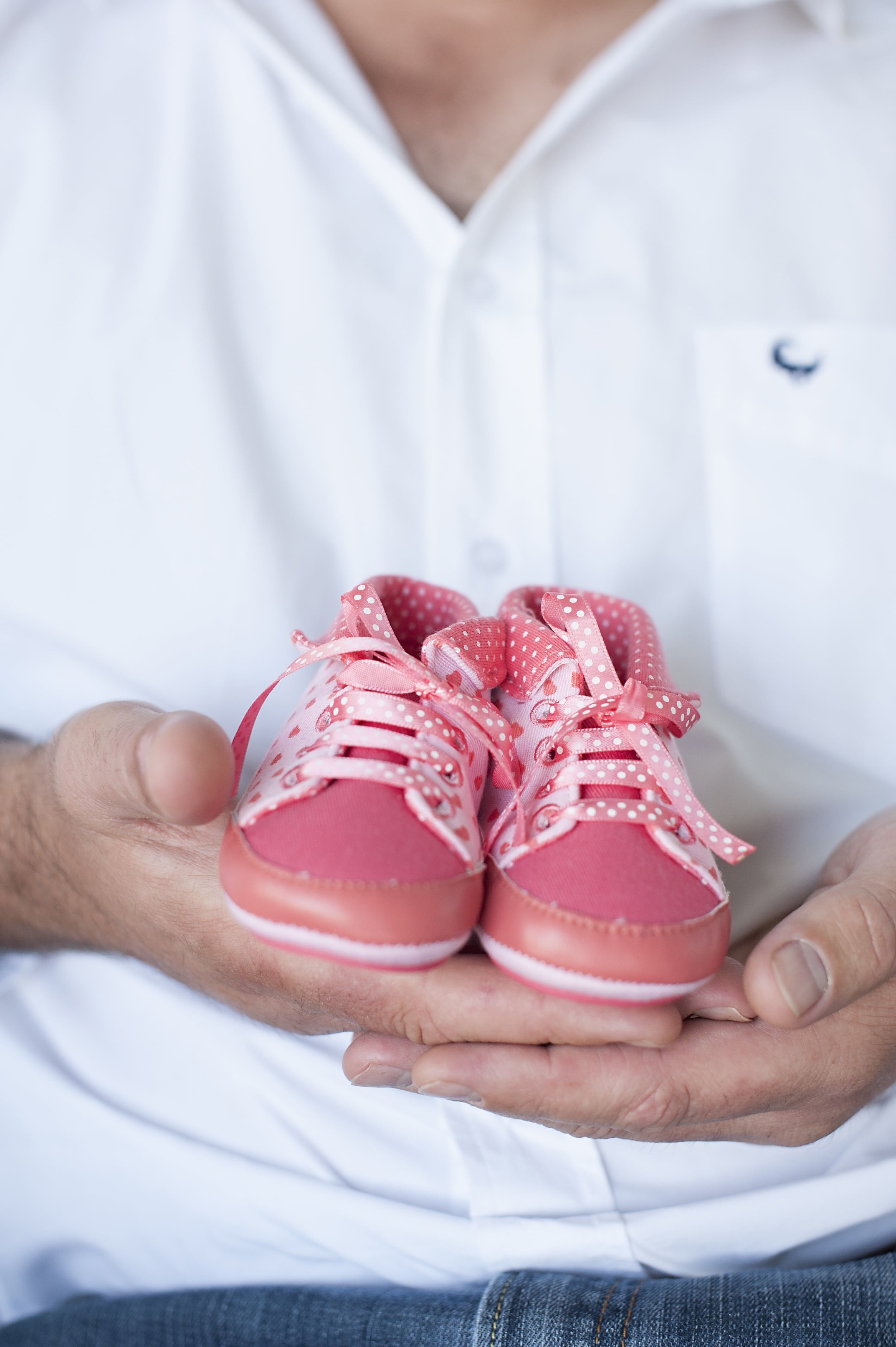parenthood, expecting, person, adults only, focus on foreground, pink, baby shoes, food and drink, indoors, lifestyles, men, pregnancy, freshness, human hand, Phone HD Wallpaper