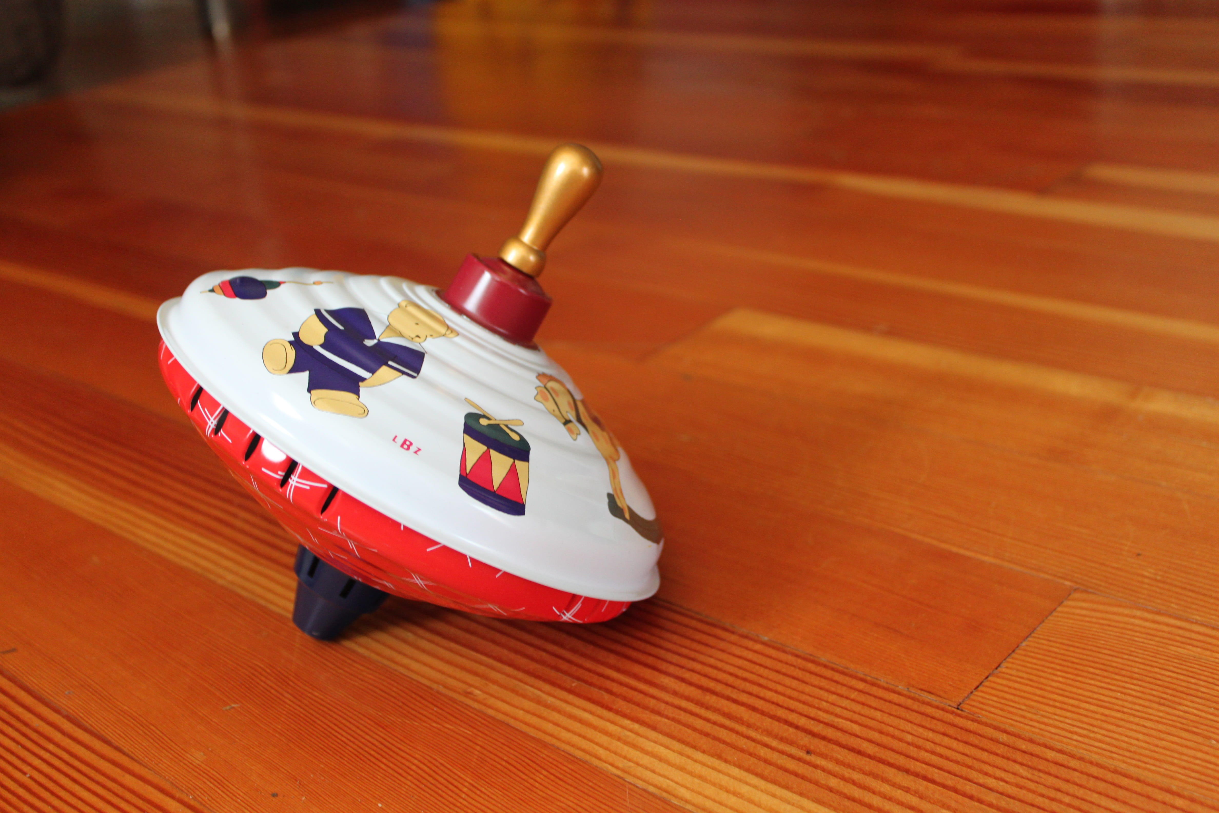turn, playroom, play, toy, wood floor, car, close-up, wooden, indoors, focus on foreground, spin toy, traditional, 4K, parenthood, single object, classic, HD Wallpaper