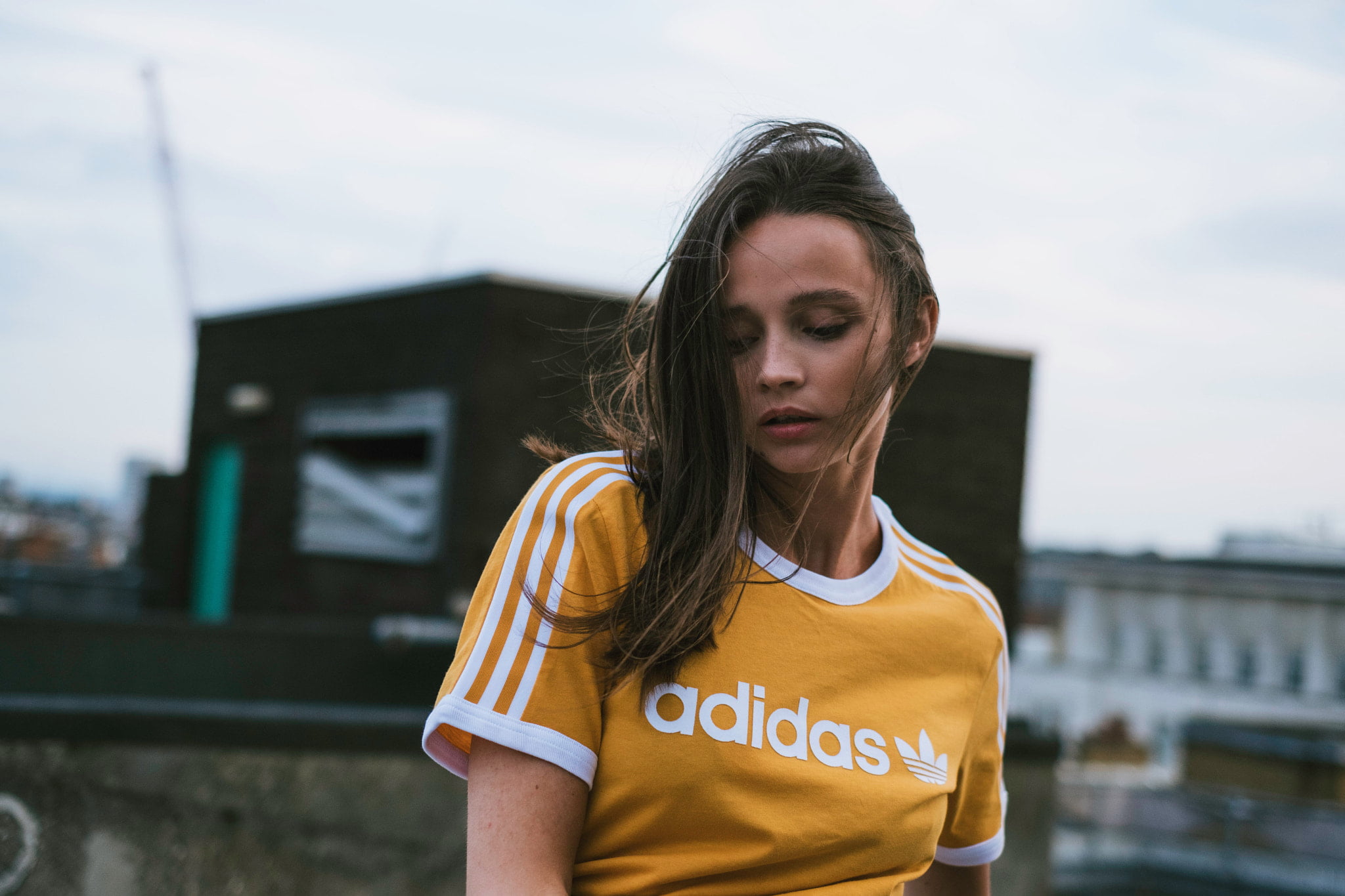 standing, blonde, architecture, one person, lifestyles, building exterior, yellow shirt, women, portrait, looking, real people, contemplation, beautiful woman, HD Wallpaper