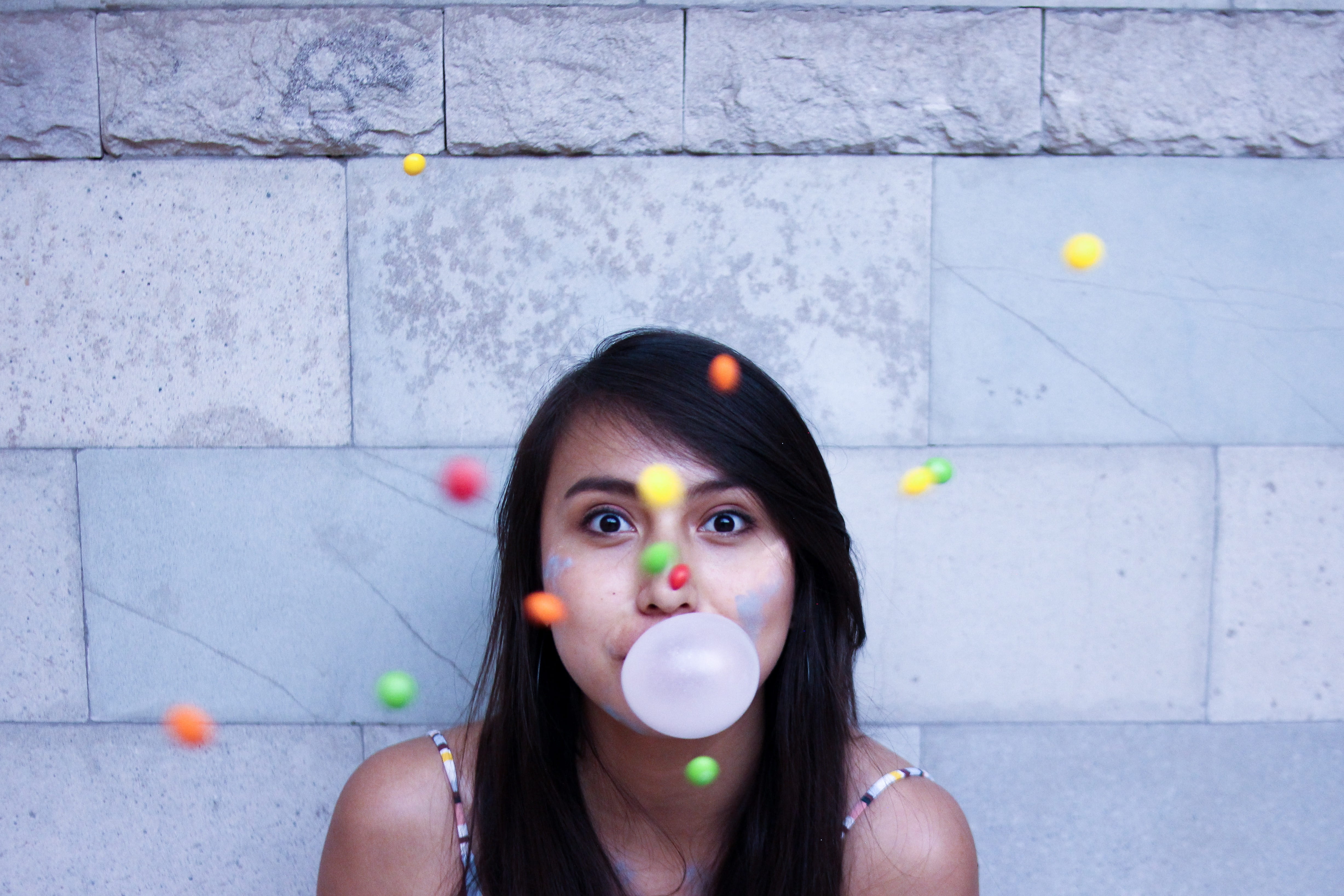 young adult, stone, near, headshot, woman, hairstyle, time, front view, one person, bubble gum, lapse, holding, hair, bubble, blowing, wall, brown hair, HD Wallpaper