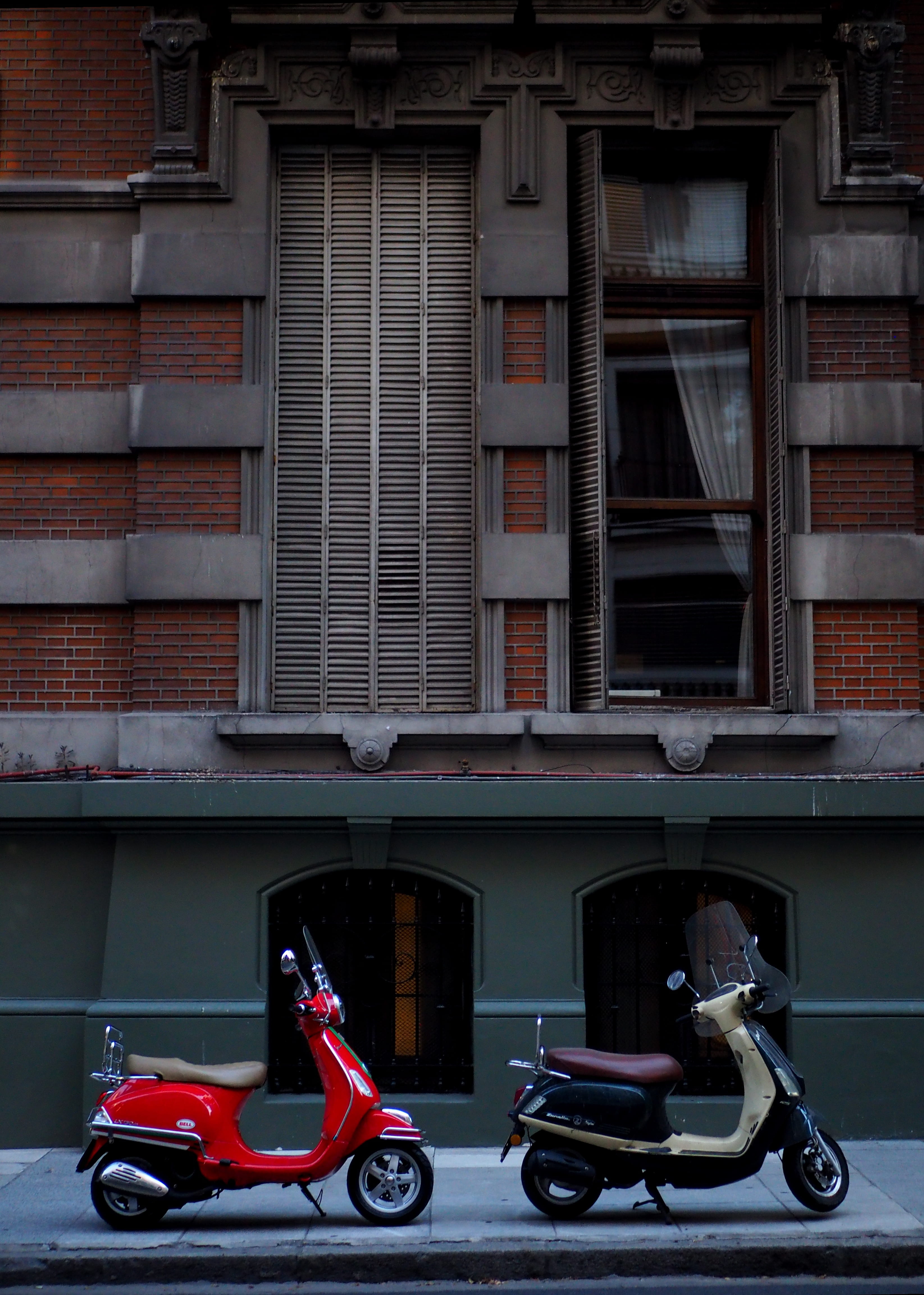 brick, stationary, window, motor, facade, building exterior, land vehicle, outdoors, day, two, motorcycle, near, no people, vespa, red, city, mode of transportation, Phone HD Wallpaper