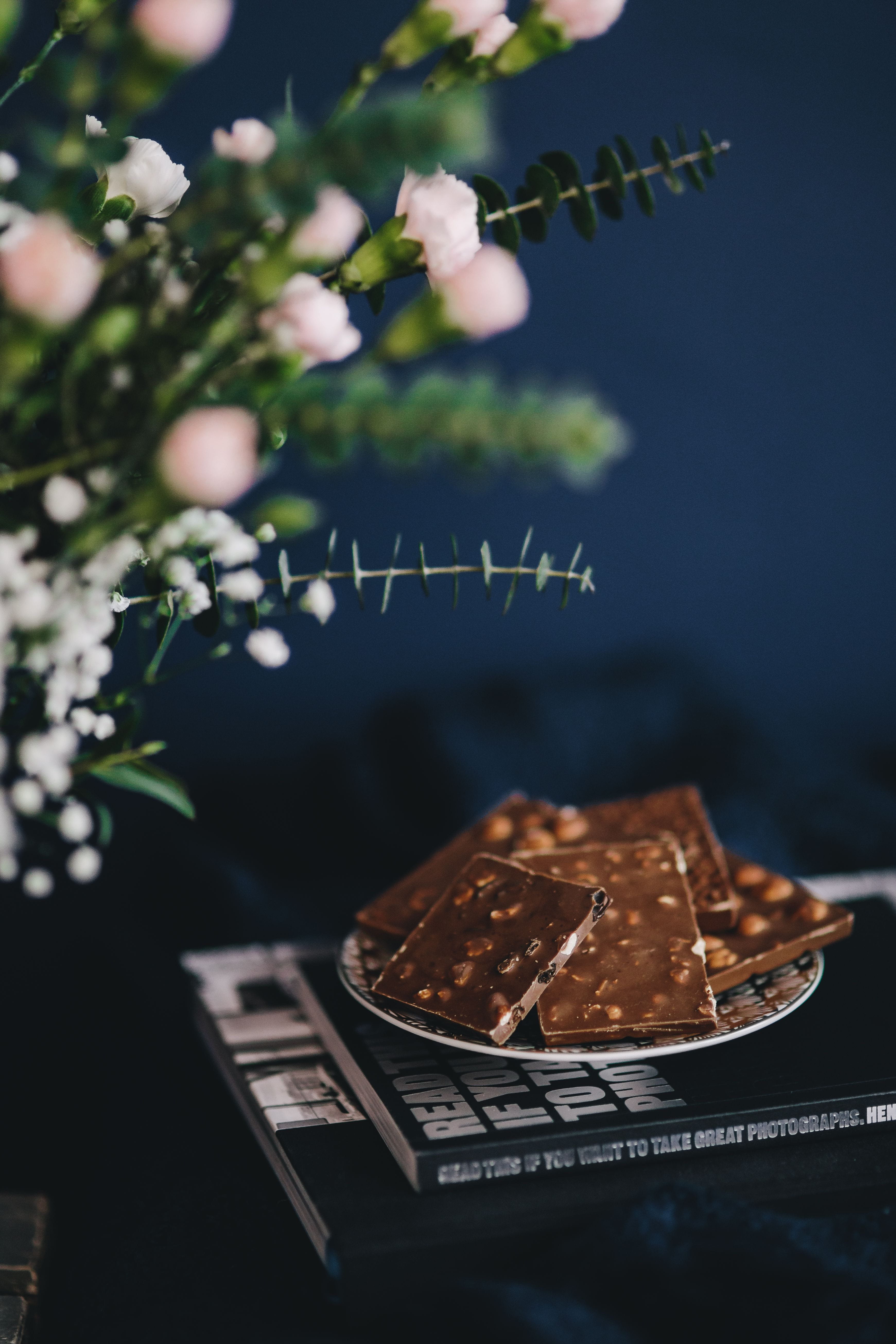 nut, selective focus, 5K, plant, cake, still life, outdoors, focus on foreground, snack, indulgence, dark, Close up, currency, food, table, temptation, Phone HD Wallpaper