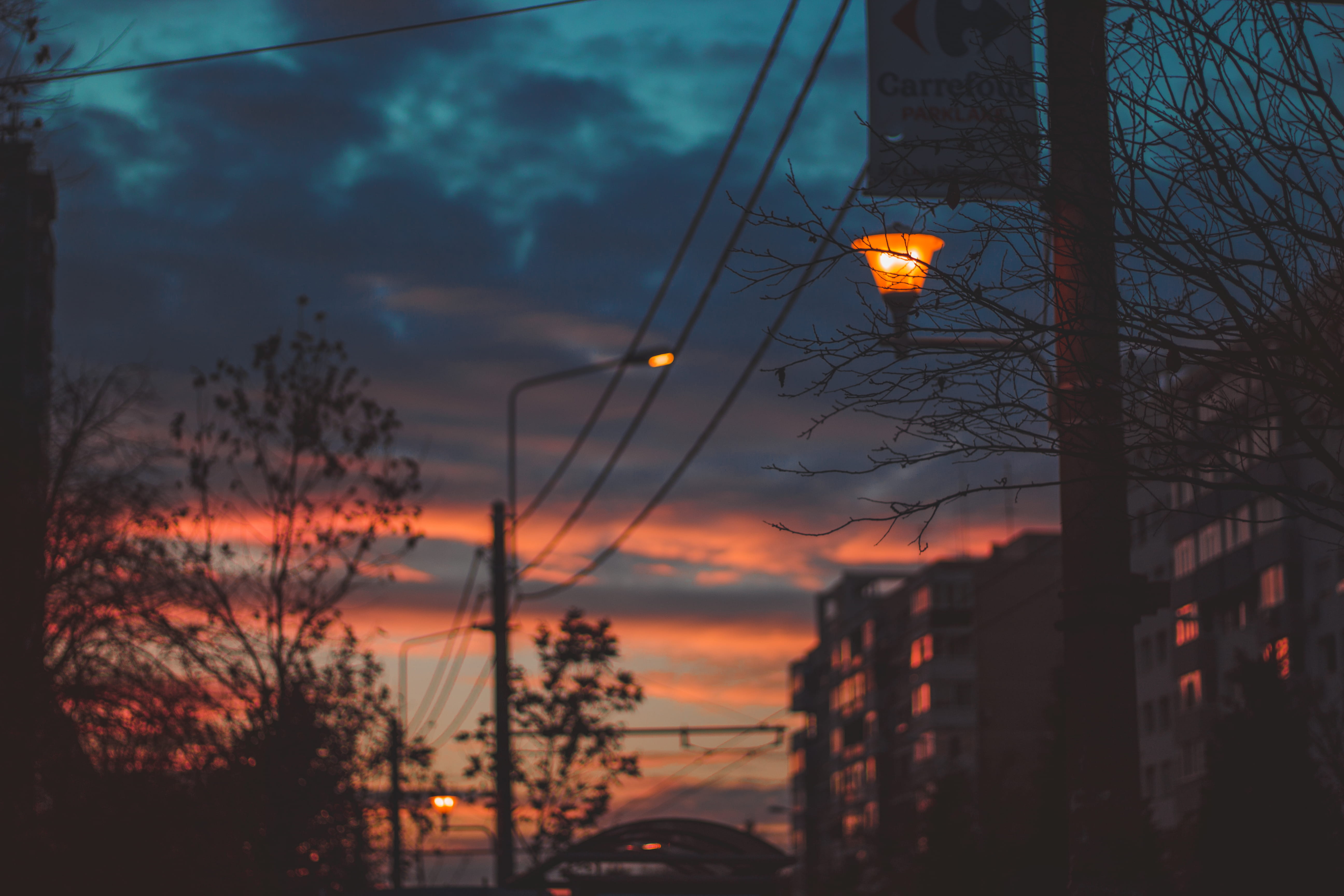 dusk, no people, romania, nature, teal, tree, beauty in nature, orange, illuminated, sky, plant, electricity, lighting equipment, sunset, focus on foreground, HD Wallpaper