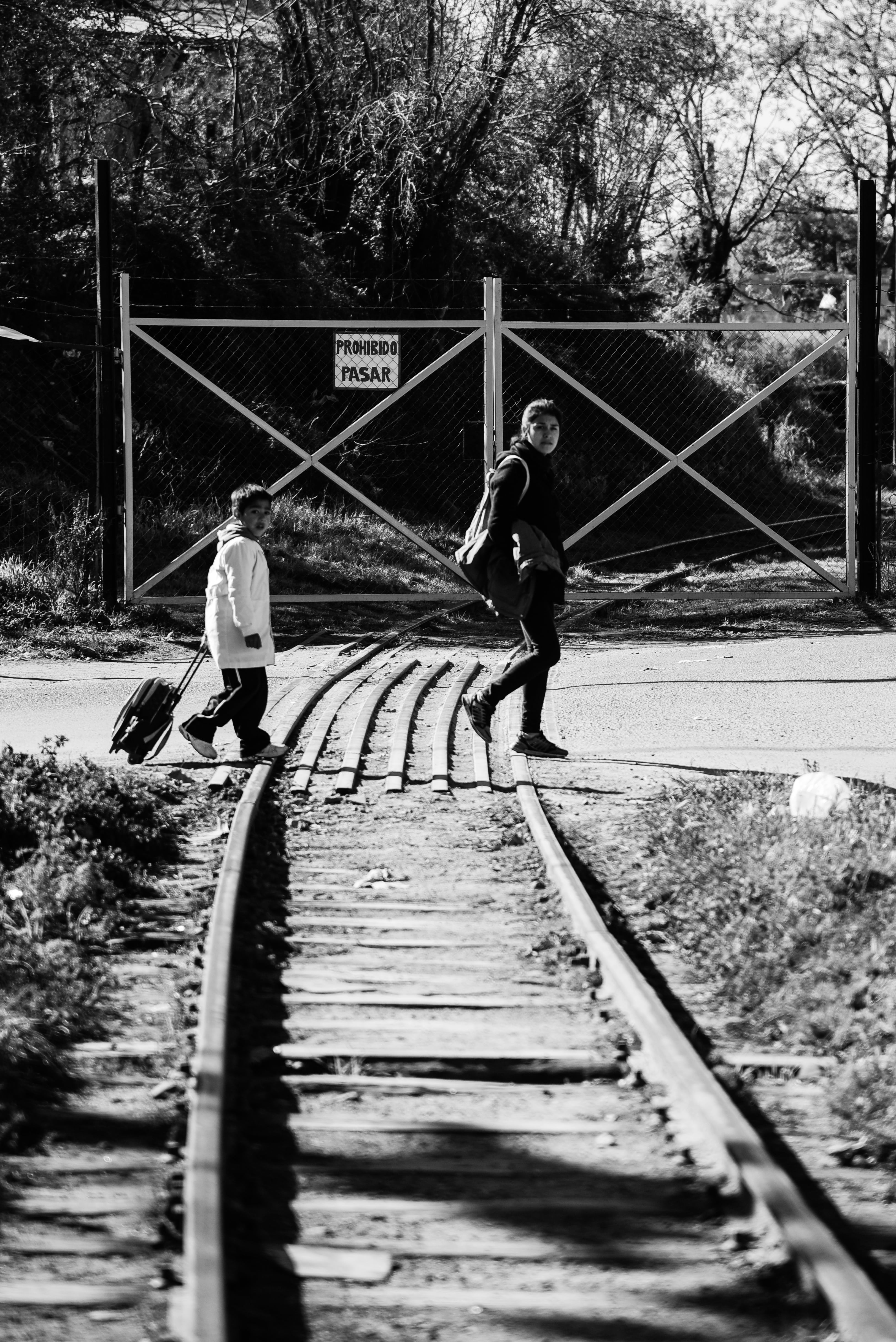 black white, day, boys, transportation, leisure activity, pathways, child, 4K, track, real life, casual clothing, lifestyles, males, tree, train, architecture, Phone HD Wallpaper