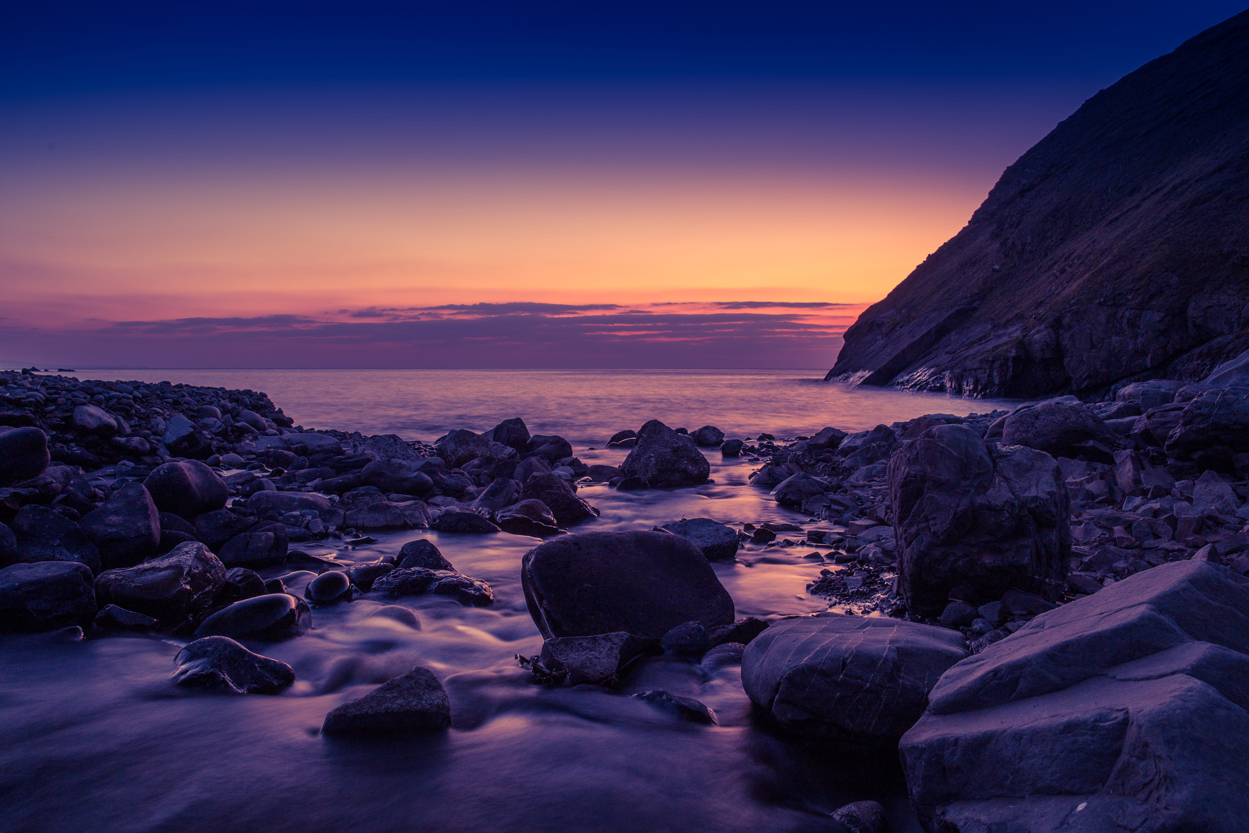 scenics, tranquil Scene, dramatic sky, solid, England, sea, purple, land, Sunset, sunrise - Dawn, nature, coast, long Exposure, rocky, seascape, sunlight, HD Wallpaper