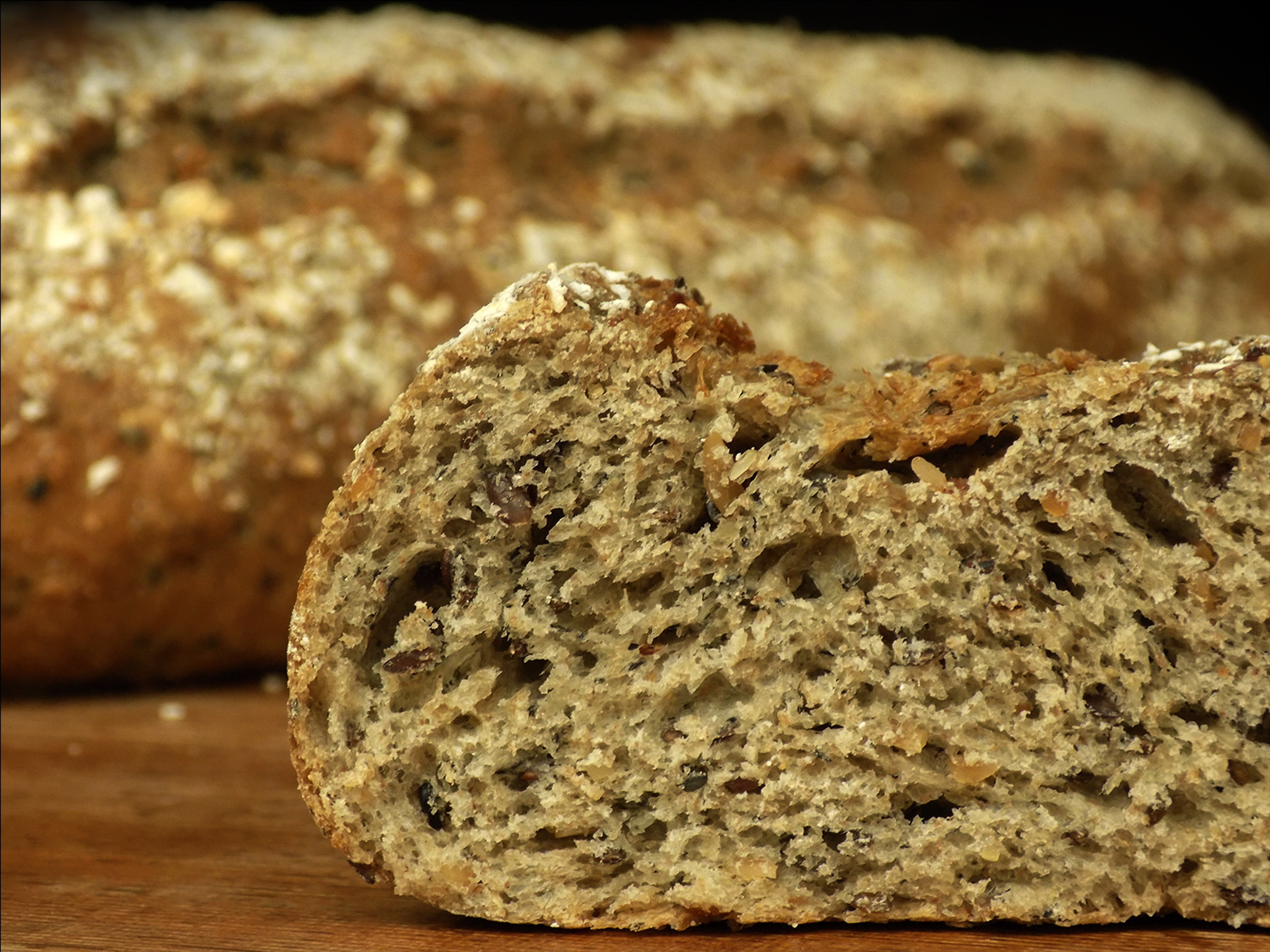 slice, brown bread, selective focus, indoors, cereals, cereal plant, nature, 5K, homemade, fiber, bread, integral, sweet food, close-up, table, ready-to-eat, HD Wallpaper