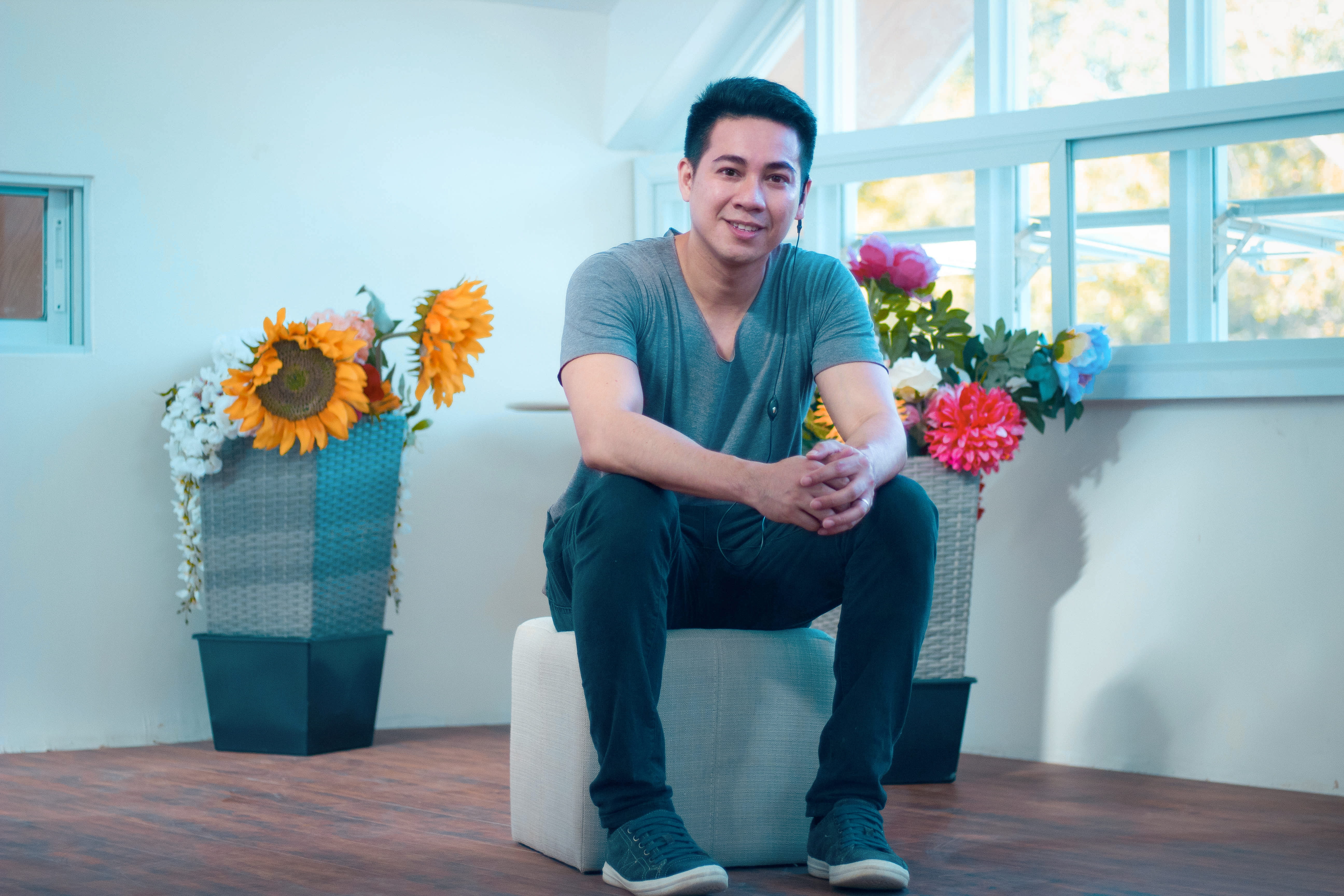 looking at camera, lifestyles, inside, vase, happiness, sitting, white, house, holding, flower, bouquet, 5K, person, one person, room, young adult, flowering plant, HD Wallpaper