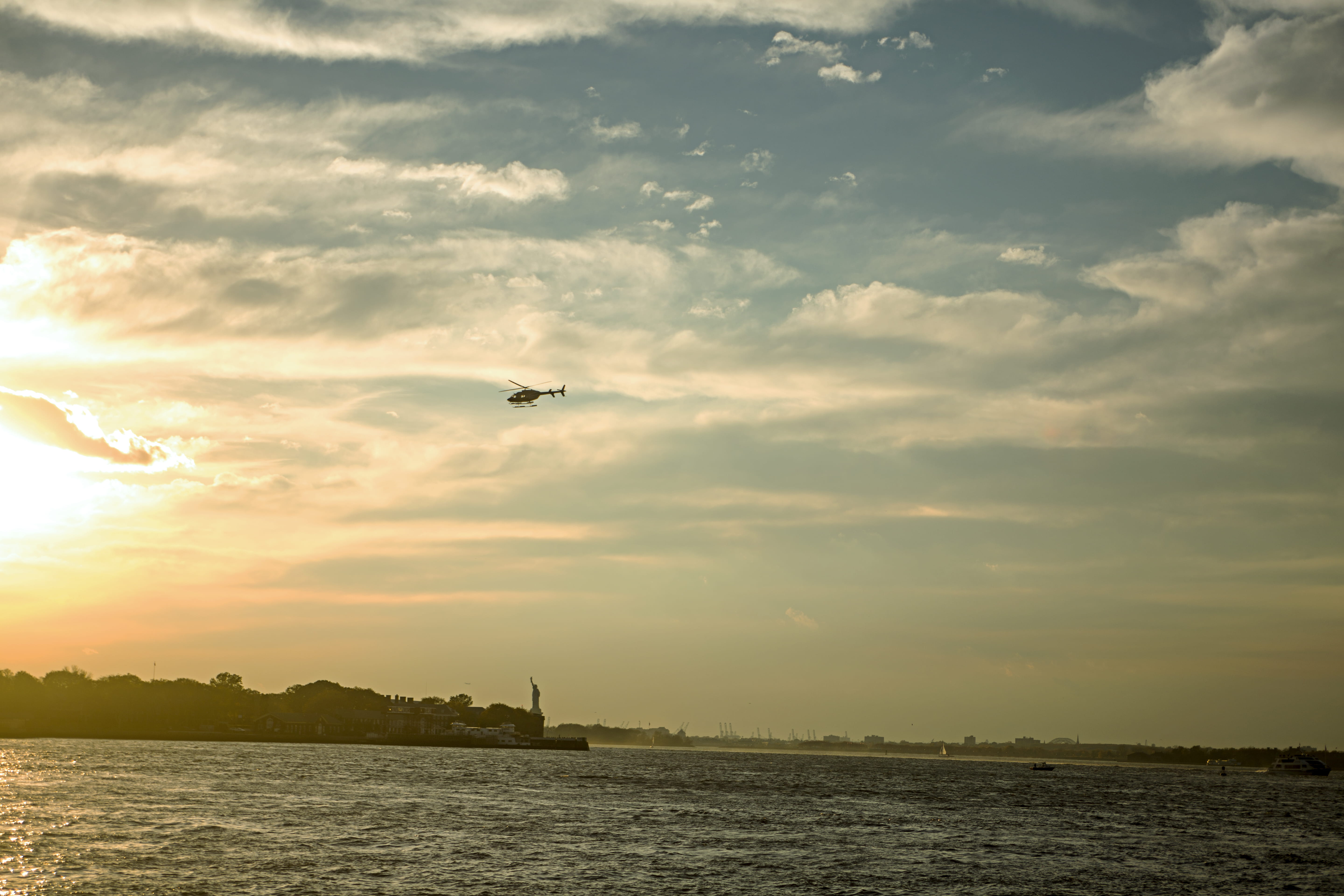 airplane, water, sunrise, animal wildlife, transportation, sunray, no people, bird, air vehicle, day, mode of transportation, winter, cloudscape, united states, HD Wallpaper