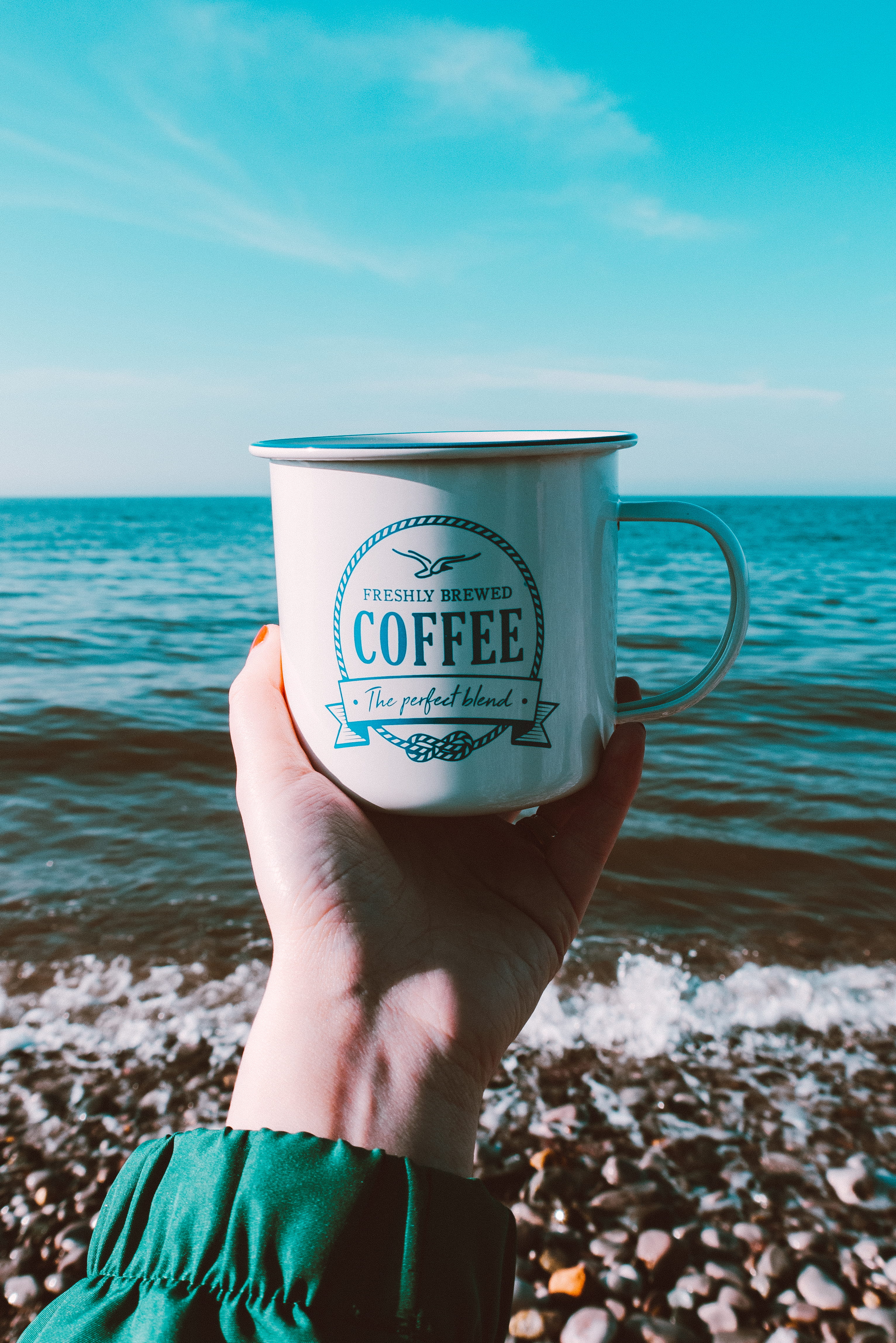real people, day, cup of coffee, horizon, one person, sky, finger, drink, refreshment, coffee - drink, stainless, cup, mug, caffeine, coffee, rocks, sea, Phone HD Wallpaper