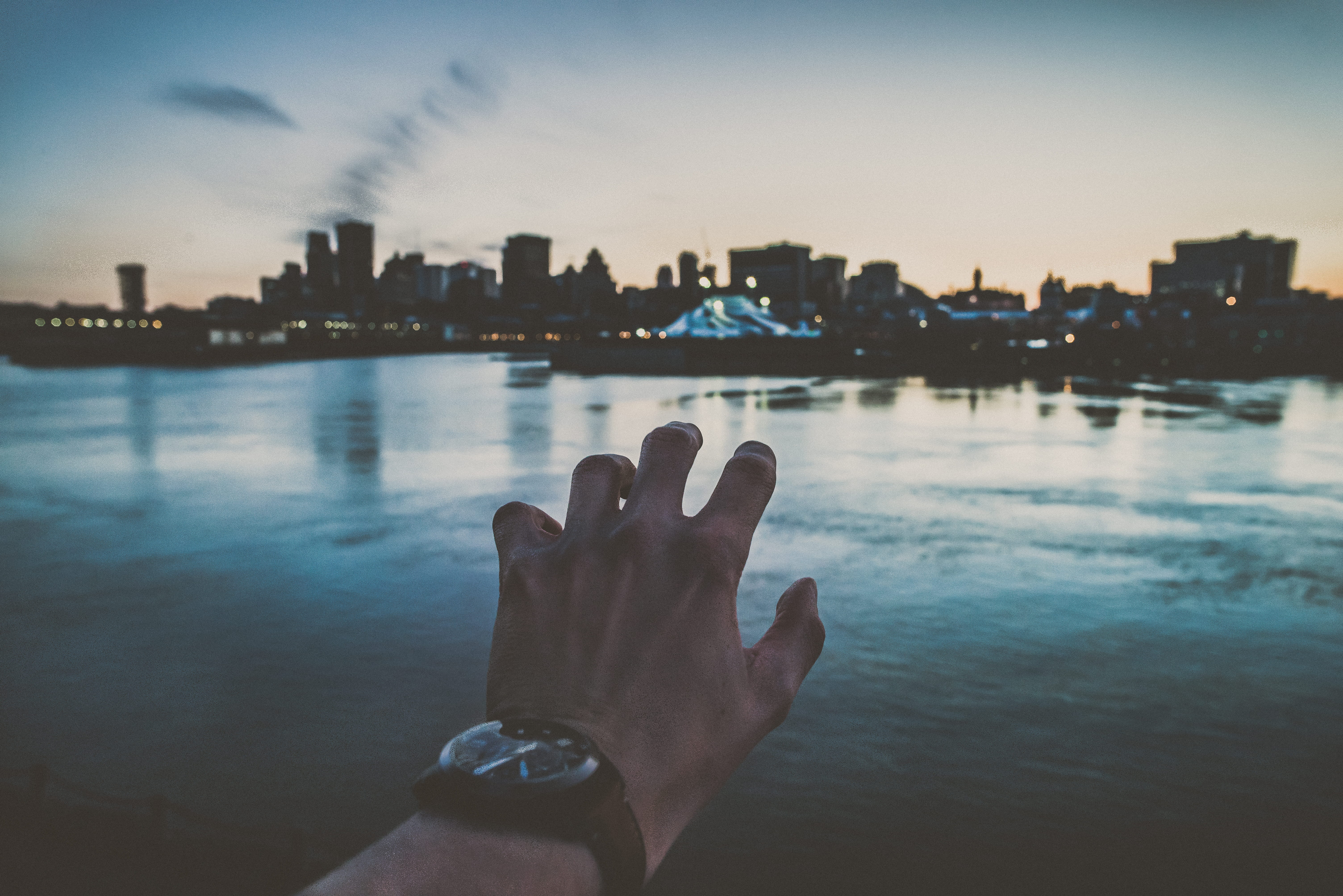 one person, unrecognizable person, architecture, person, human body part, illusion, left, nail, outdoors, human limb, sunset, 5K, building exterior, dawn, HD Wallpaper