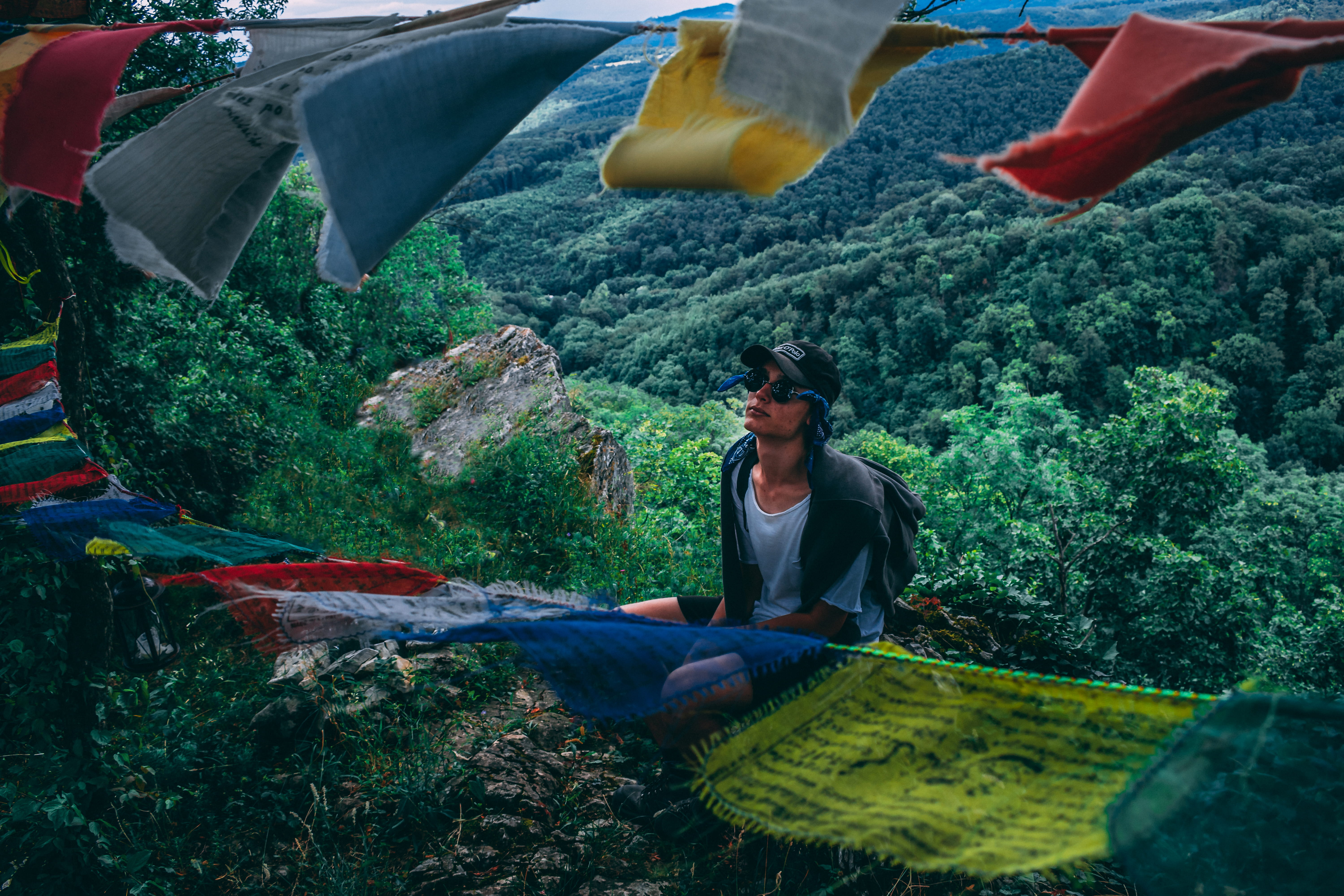 full length, adventure, land, colourful, casual clothing, adult, young adult, scenic, flags, hike, black, cap, daylight, hiking, fashion, mountain, outdoors, HD Wallpaper