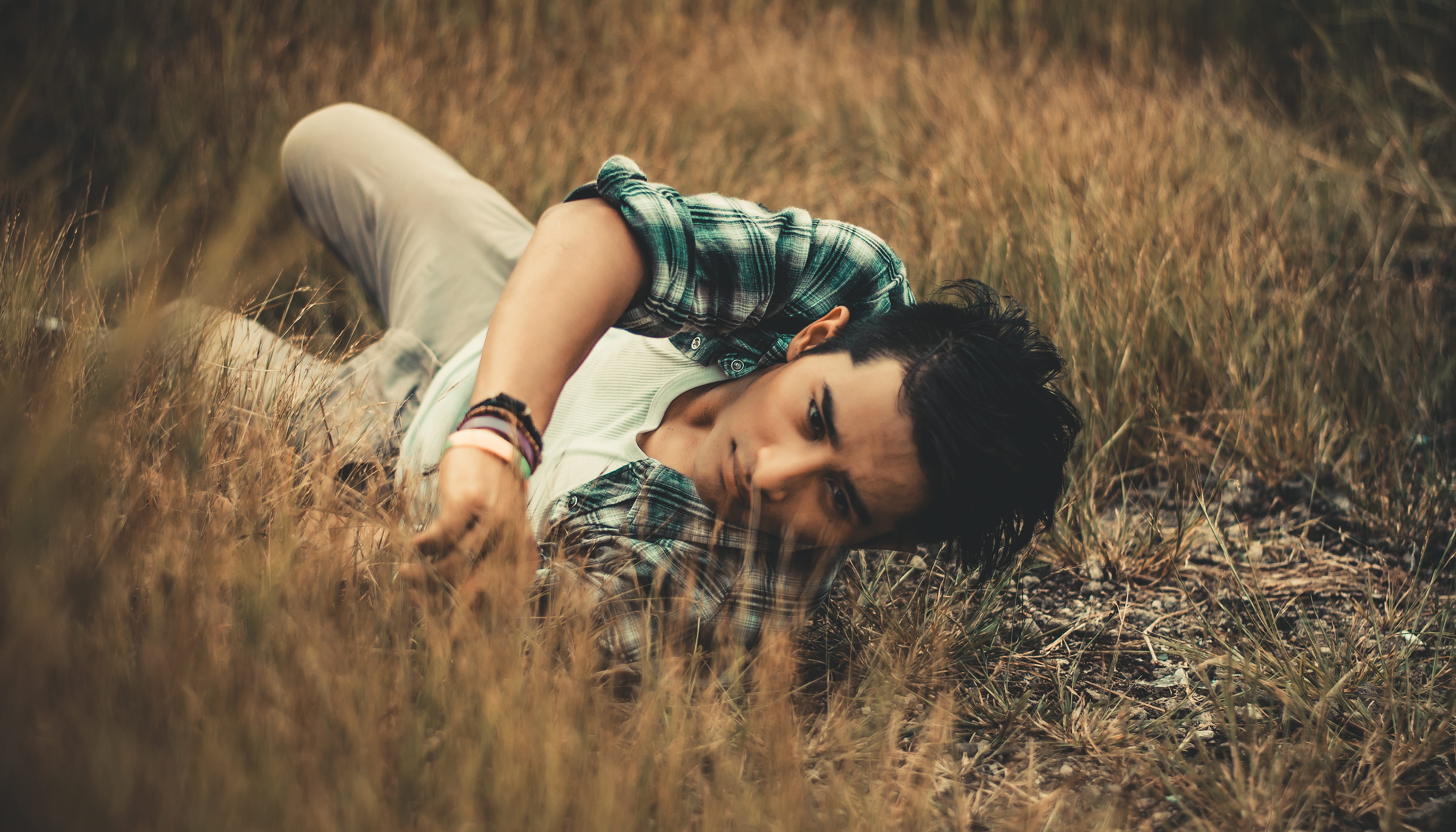 one person, grass, pose, wear, human, facial expression, grassland, outfit, men, field, nature, person, daytime, environment, leisure activity, youth, man, HD Wallpaper