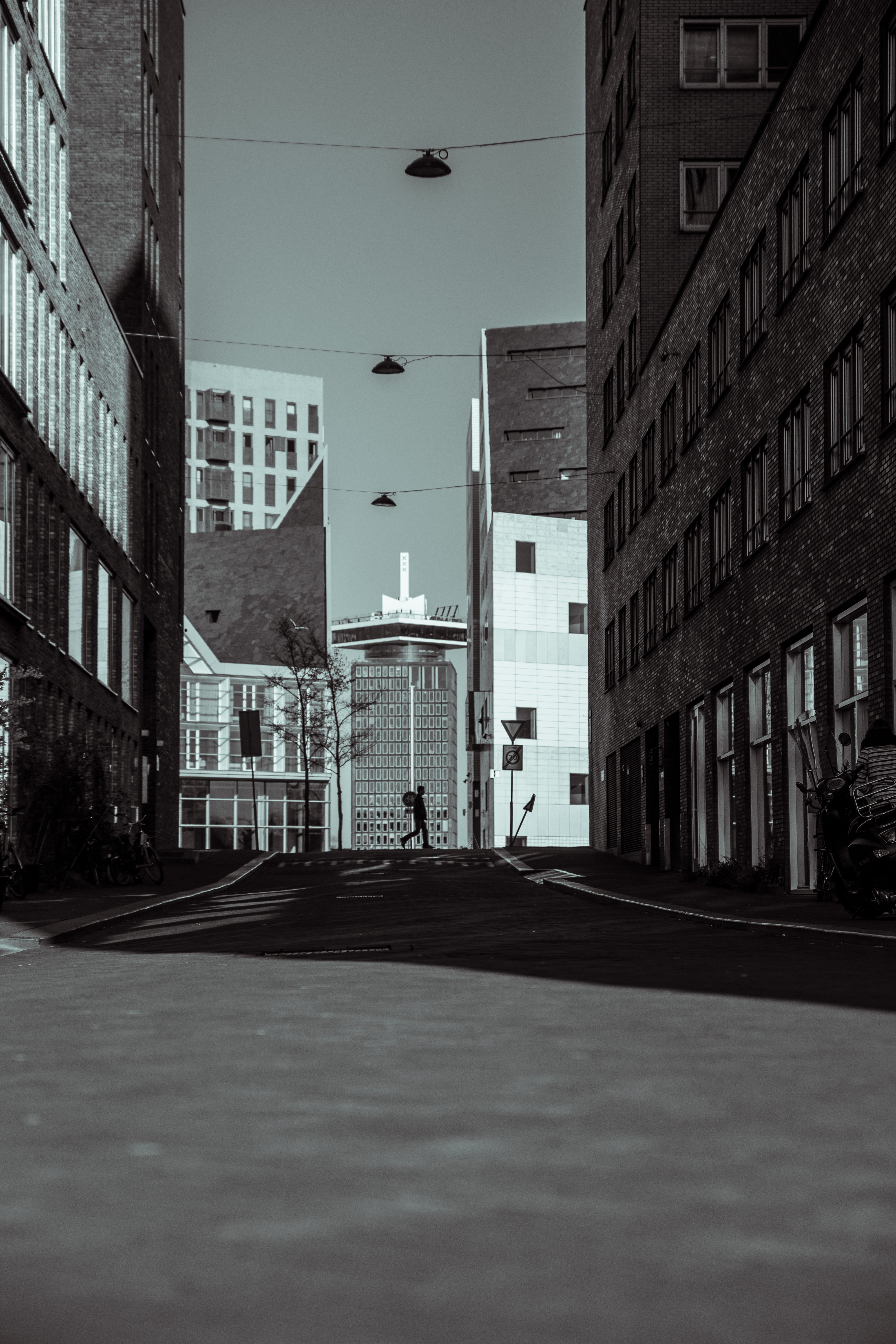 sky, urban, figure, crossing street, city life, building exterior, the way forward, grayscale, daytime, walking, black and white, building, city, person, Phone HD Wallpaper