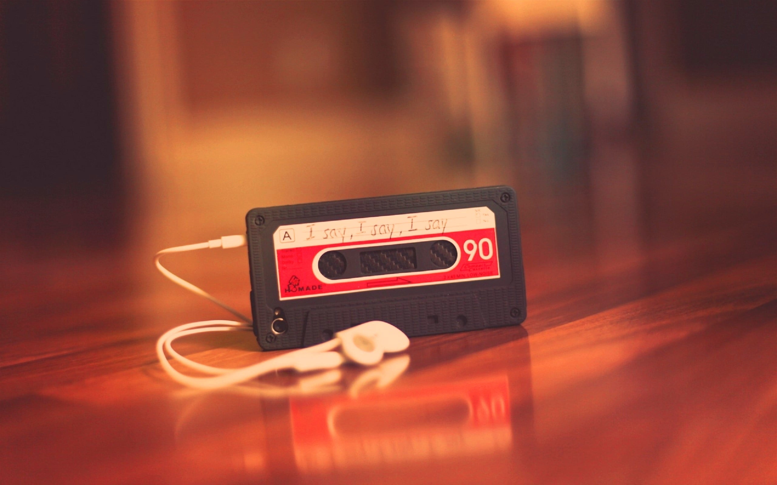 portable information device, single object, arts culture and entertainment, player, no people, black, wireless technology, 2K, wood - material, flooring, HD Wallpaper