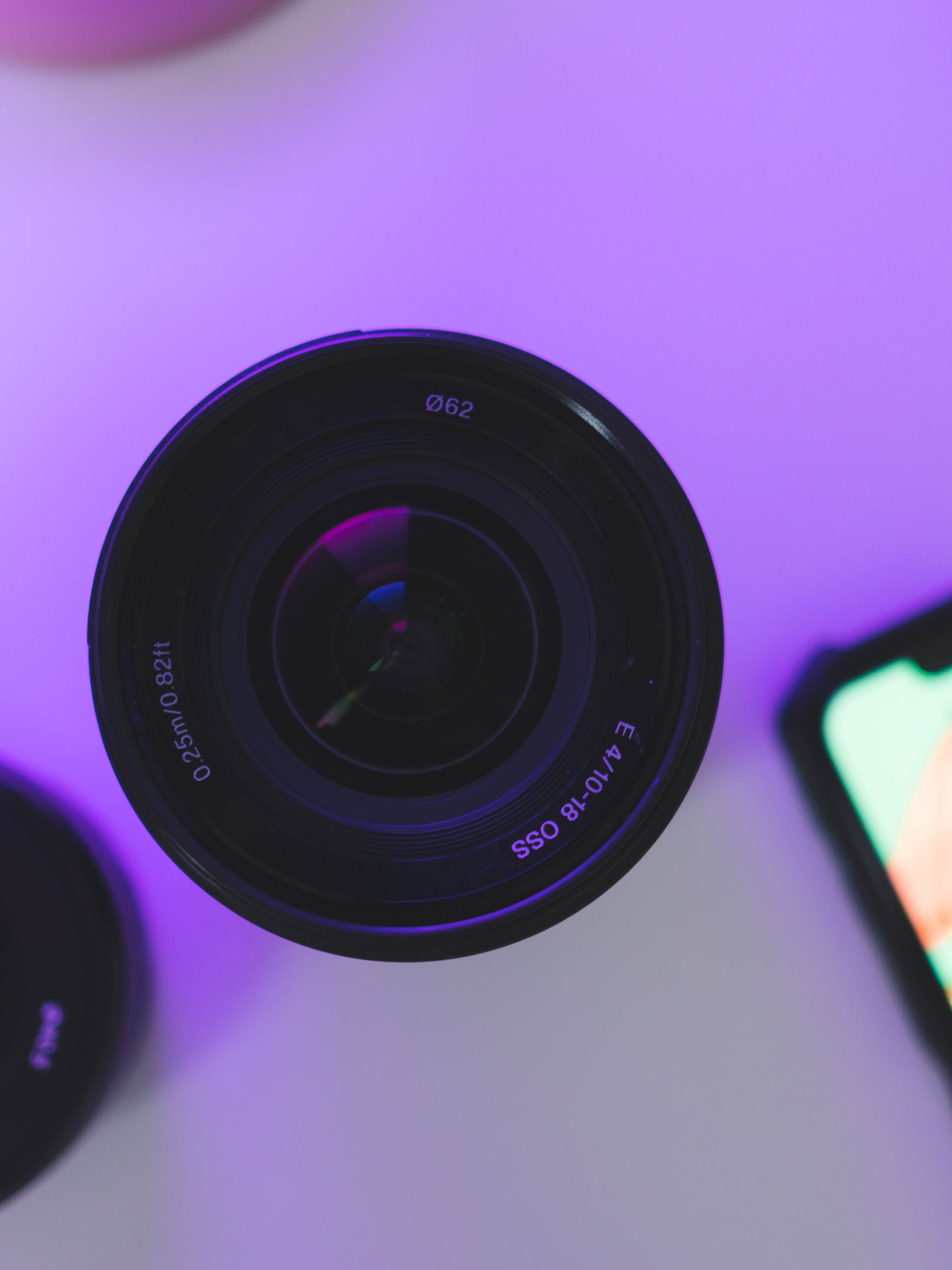 home video camera, indoors, sony apsc, sony sel, sony fe, gear, studio shot, clean, camera lens, sony a7iii, no people, lens., 4K, purple, minimalism, Phone HD Wallpaper