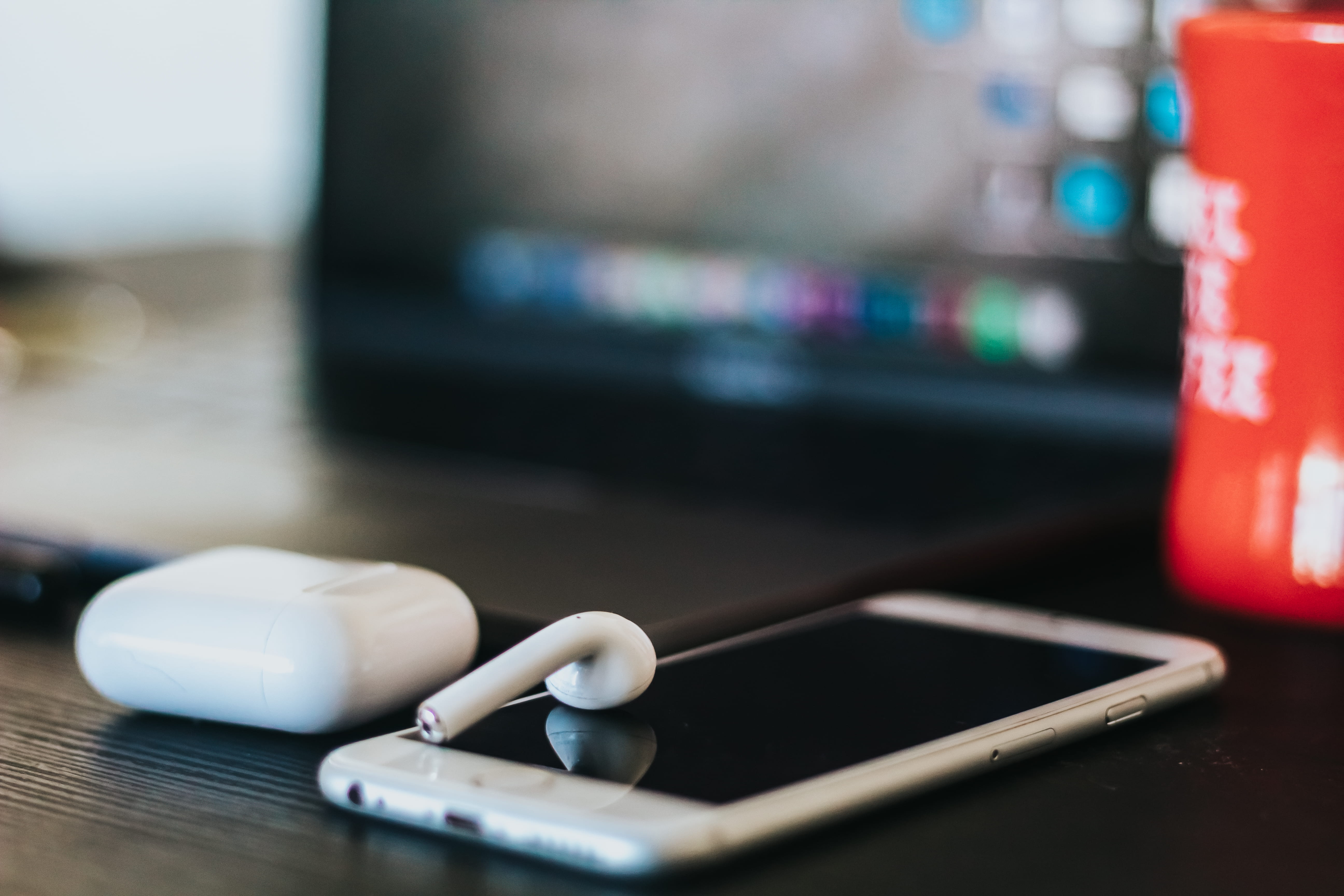 communication, cup, computer monitor, mobile phone, wireless technology, person, airpods, 5K, smart phone, portable information device, screen, showing, HD Wallpaper