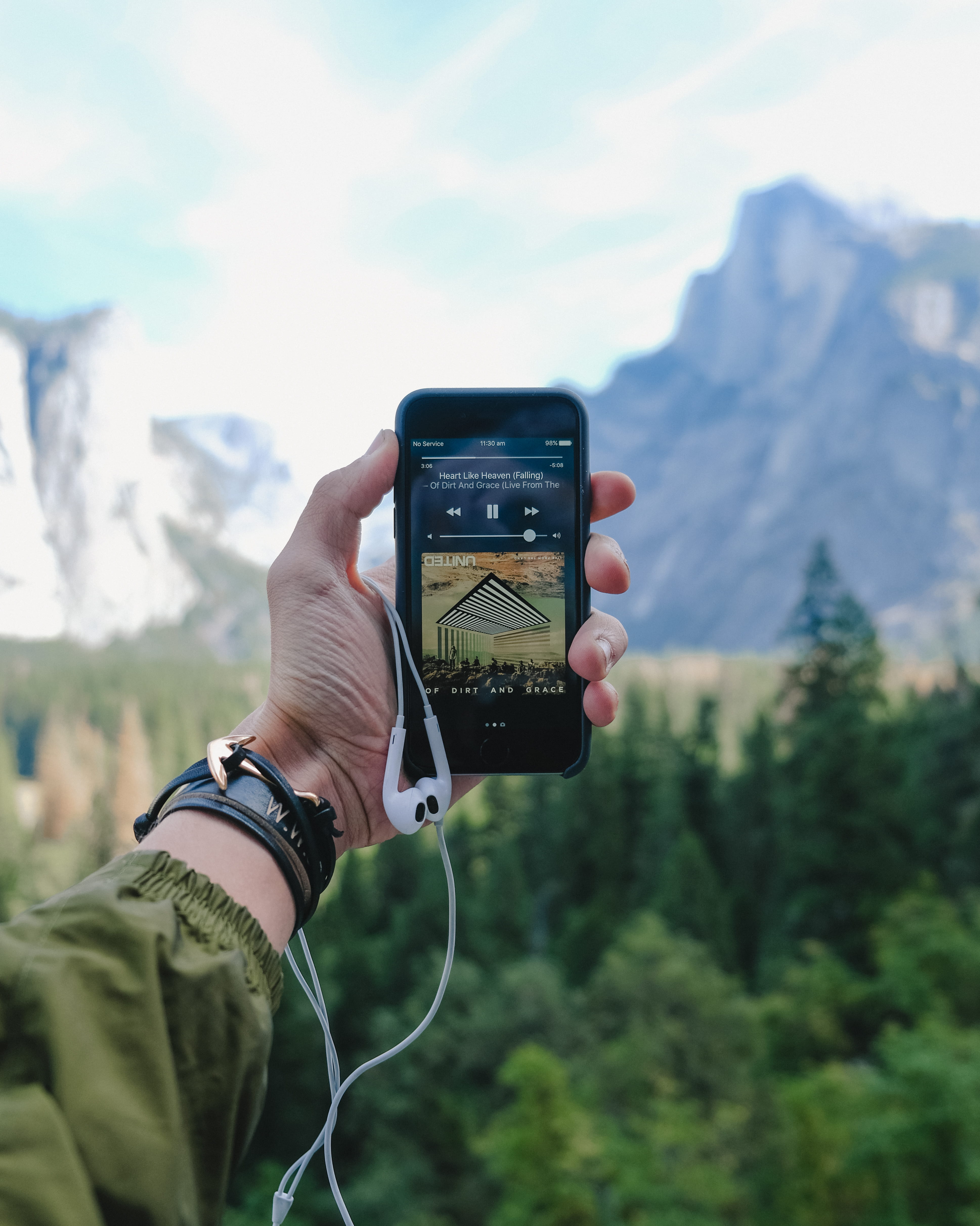 smart phone, music background, human hand, leisure activity, forest, human body part, mountain, pine, screen, outdoors, wristwatch, nature, 4K, activity, Phone HD Wallpaper