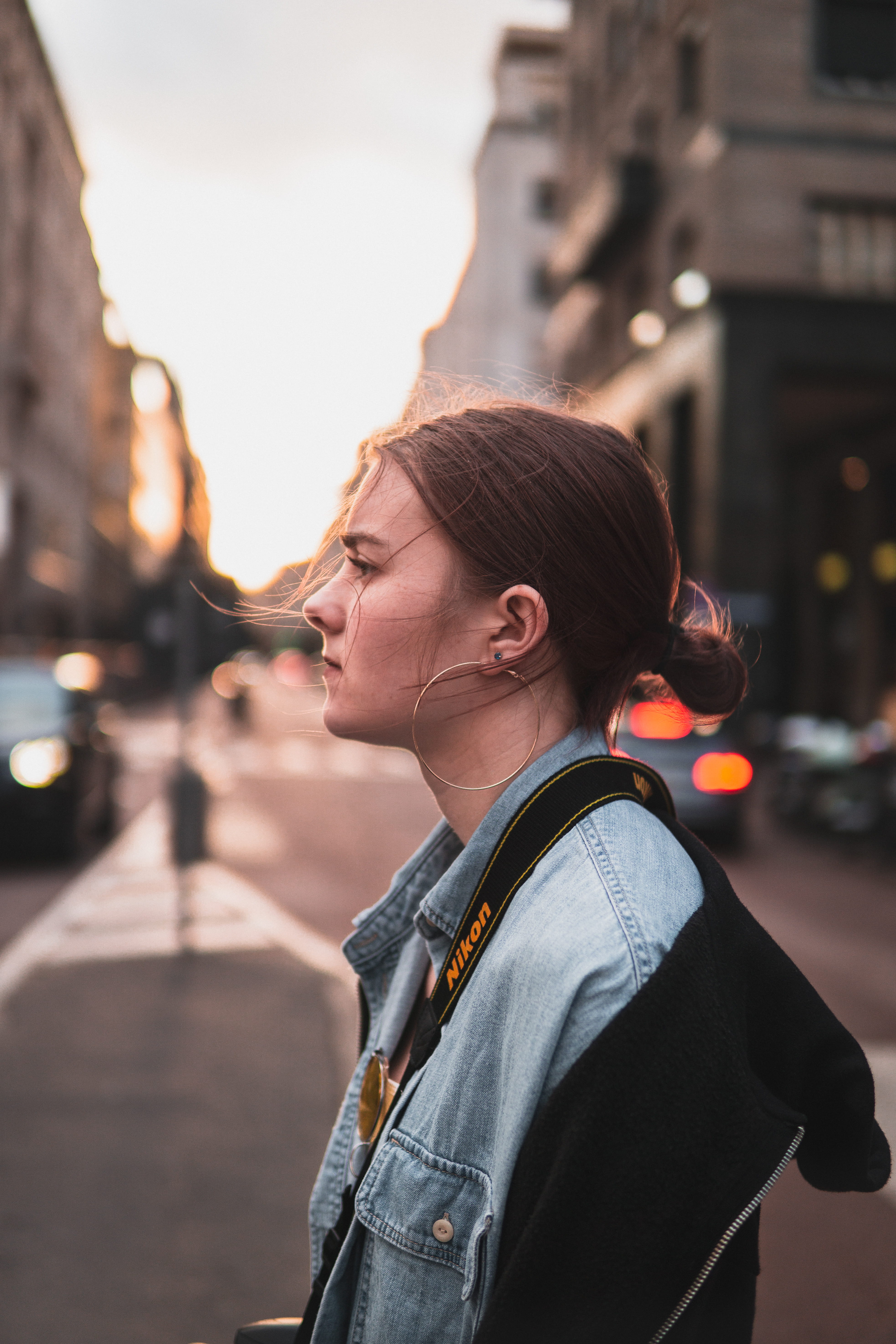 outdoors, girl, young, leisure activity, female, brunette, lady, street, built structure, real people, bun, incidental people, city, focus on foreground, Phone HD Wallpaper