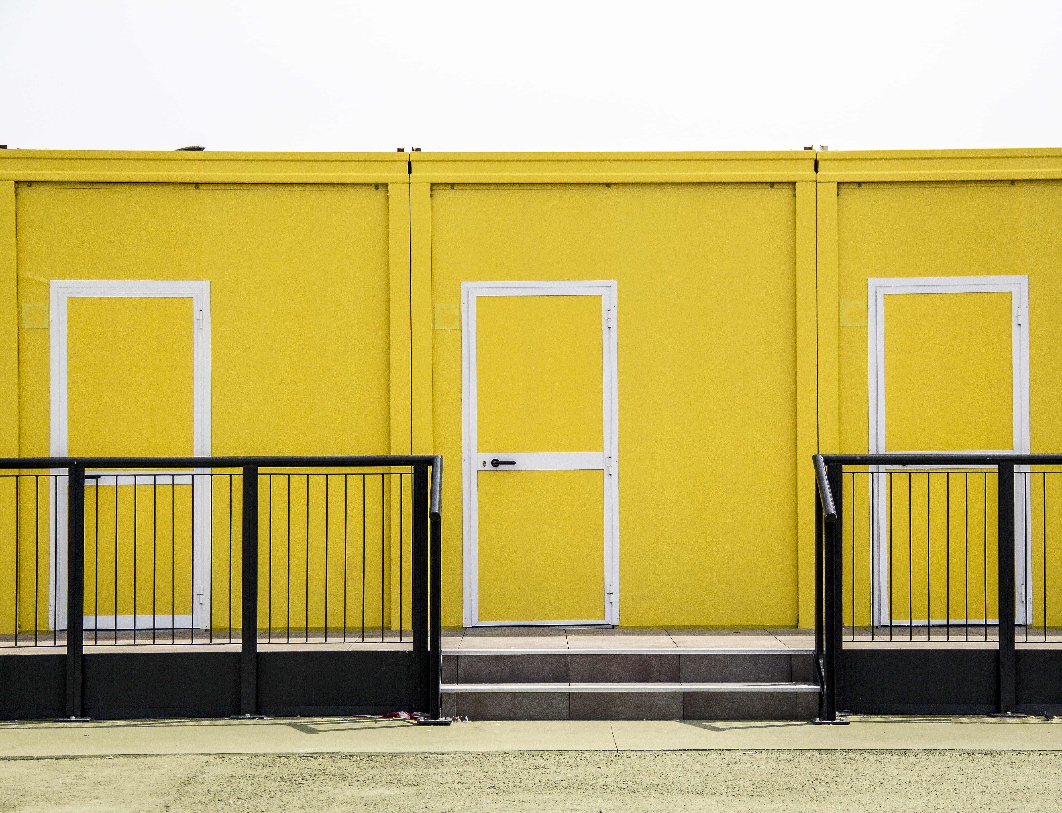 design, exterior, nature, no people, architecture, wall, day, closed, door, rails, in a row, safety, metal, painted, yellow, unit, built structure, hand, HD Wallpaper