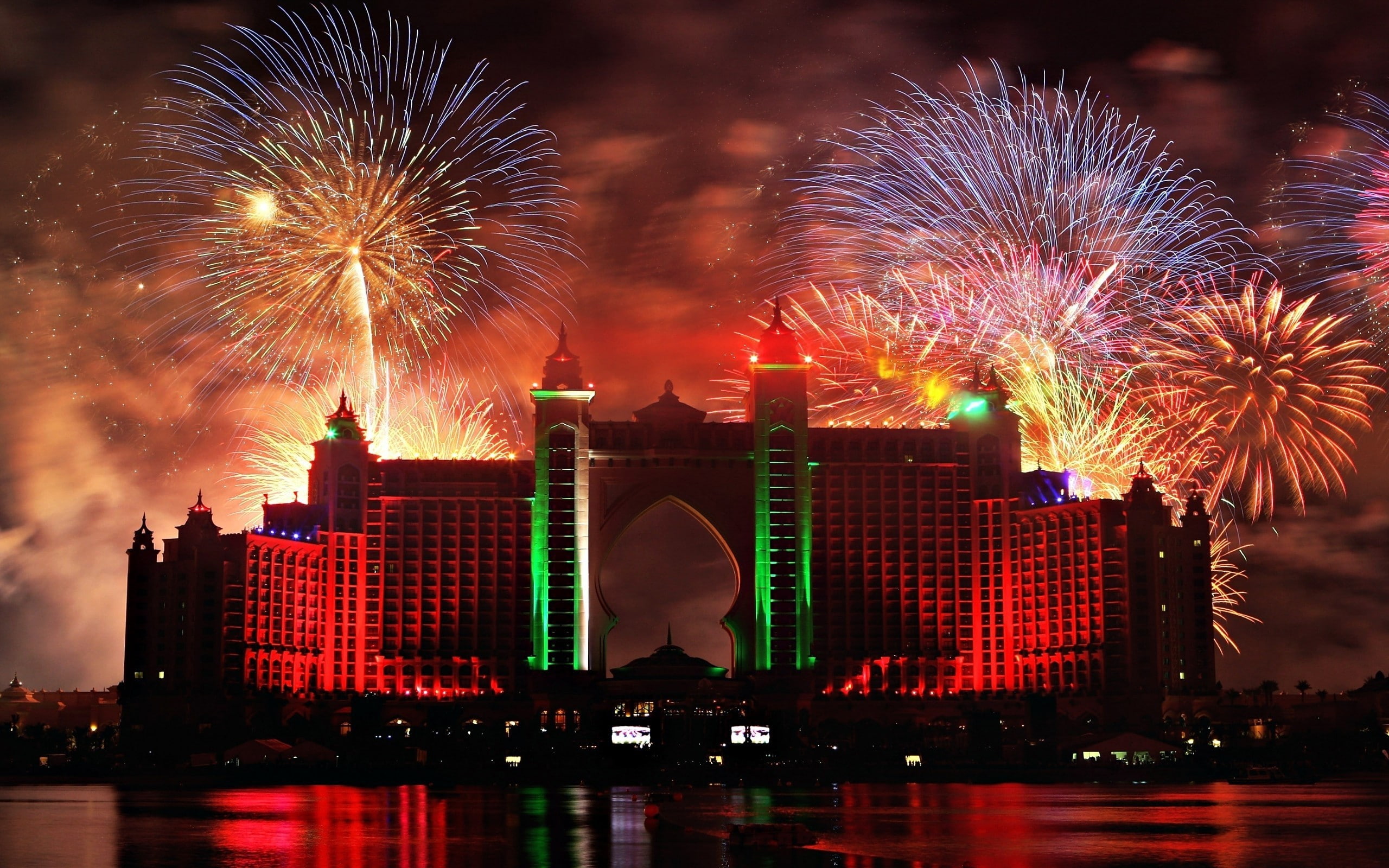 night, Abu Dhabi, building exterior, water, illuminated, motion, 2K, skyscraper, new years eve, fireworks, building, event, exploding, city, cityscape, HD Wallpaper