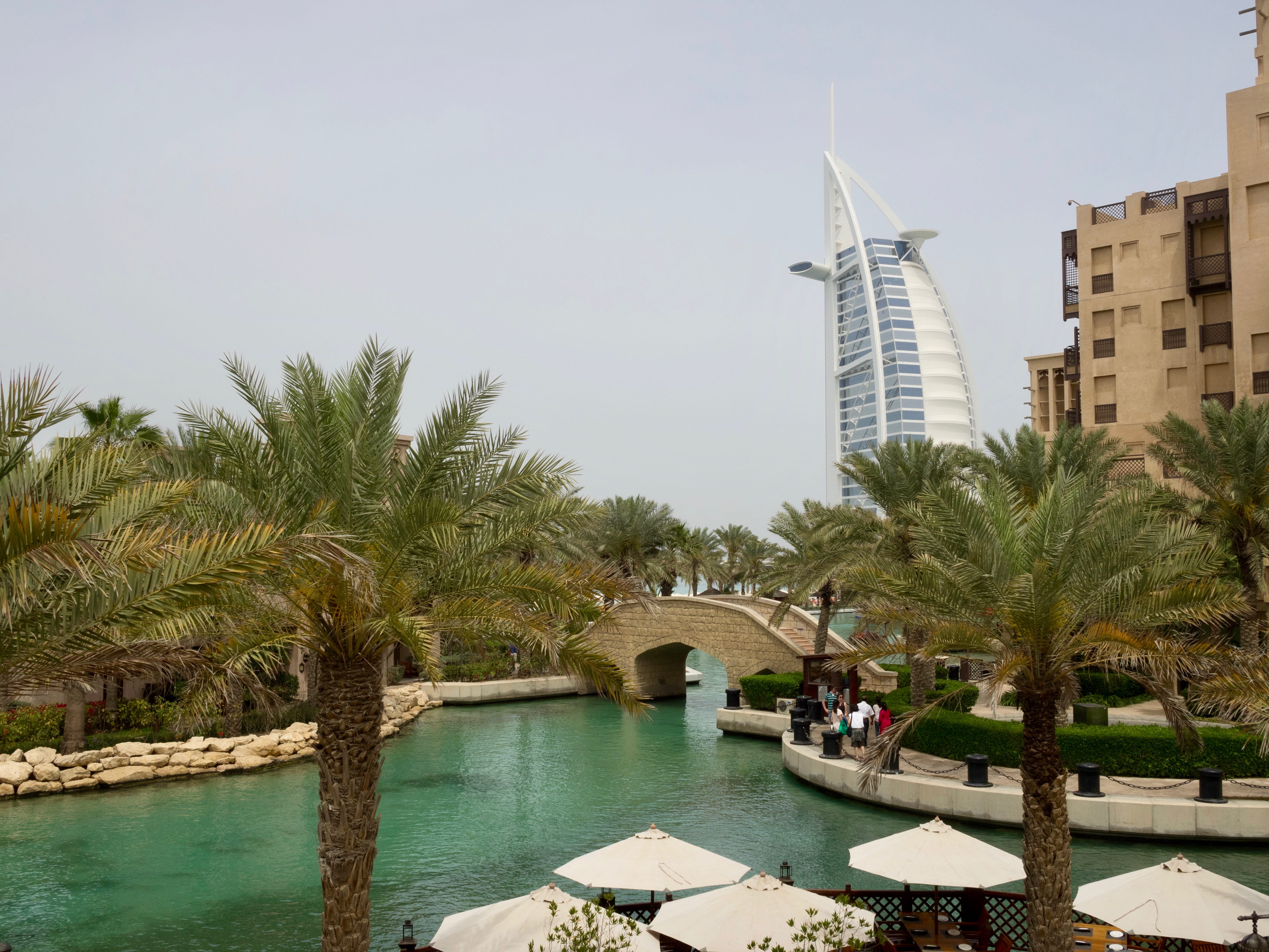 nautical vessel, palm tree, 4K, united arab emirates, travel, river, skyscraper, water, growth, plant, building exterior, tree, hotel, sky, burj al arab jumeirah, HD Wallpaper