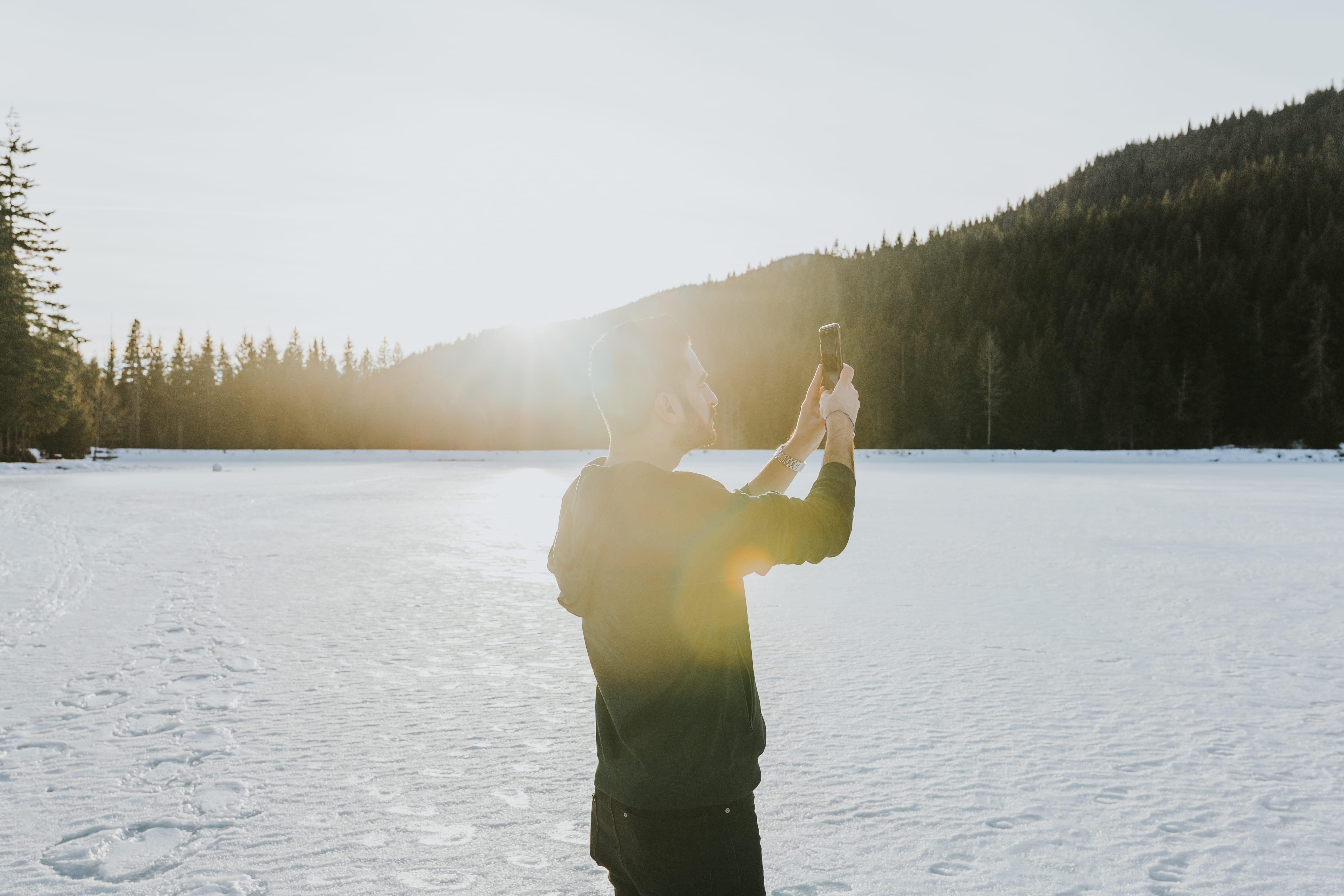 taking, cold temperature, one person, day, warm clothing, snow, human arm, near, plant, arms raised, winter, apparel, tranquil scene, ice, lens flare, non-urban scene, HD Wallpaper