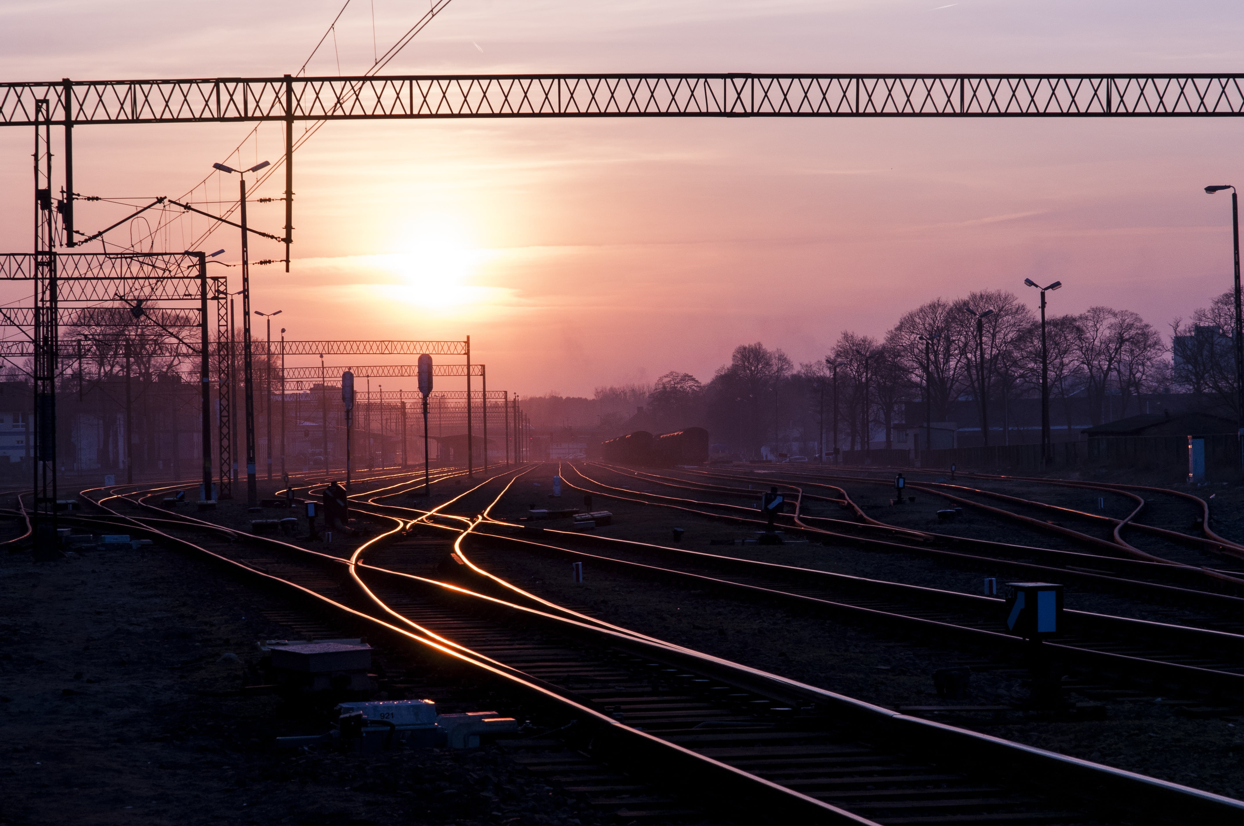 outdoors, steel, sunset, industrial, line, sunlight, railroad Track, sky, rail transportation, area, railroad, train - vehicle, technology, connection, HD Wallpaper