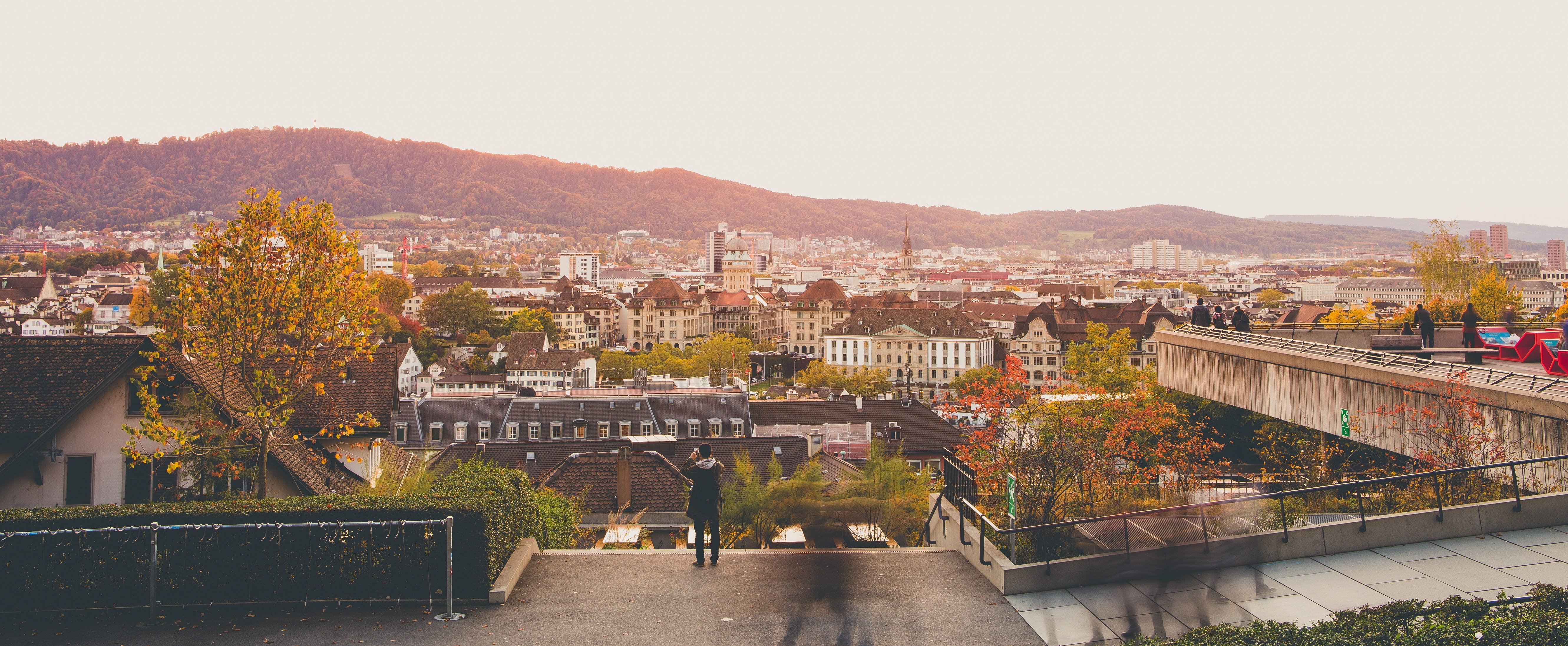high angle view, sunset, mountain, sky, city life, roof, cityscape, built structure, residential district, eth zürich, switzerland, city, real people, crowd, HD Wallpaper