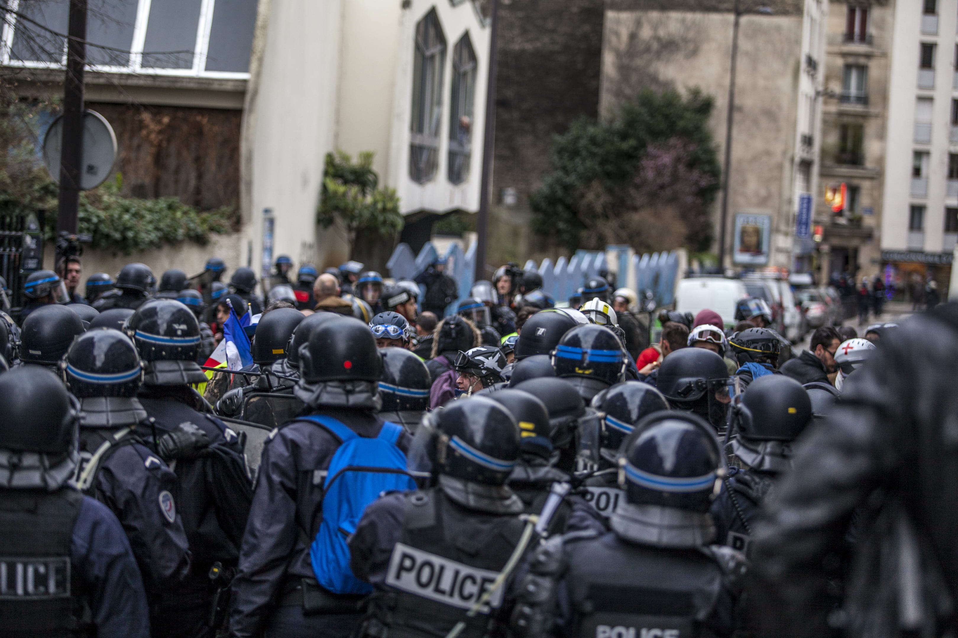 police, city, beside, architecture, vehicle, people, standing, building exterior, group of people, armored, person, hardhat, government, protestor, helmet, HD Wallpaper