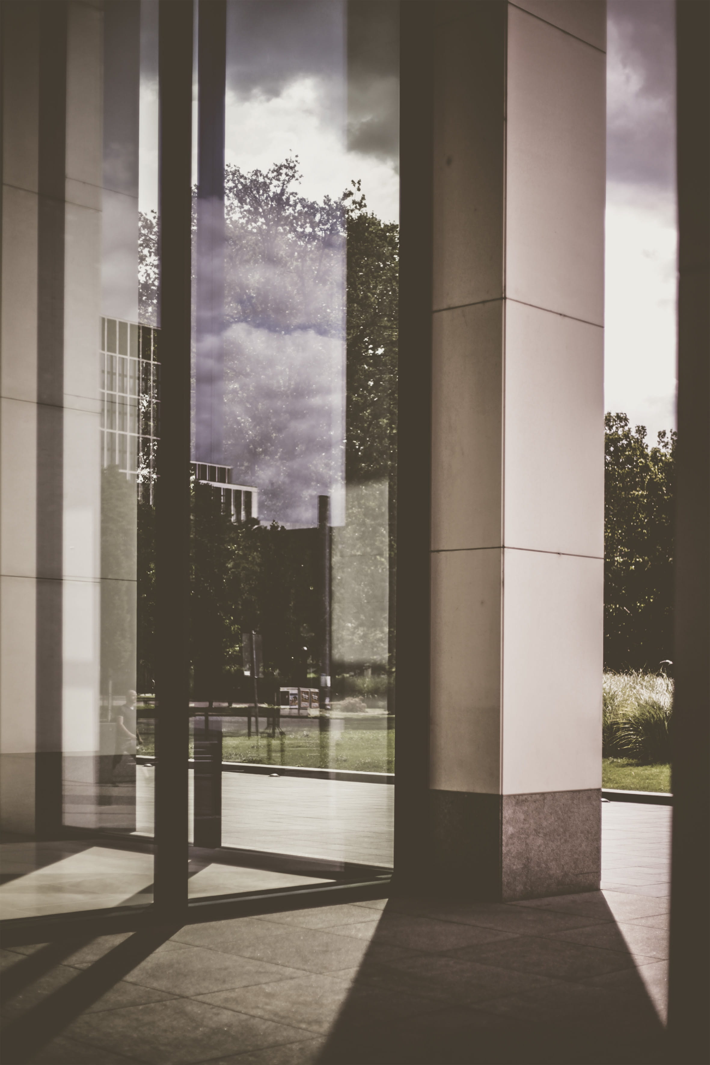window, pillar, sliding door, flooring, architecture, cloud - sky, day, transparent, lobby, room, built structure, sunlight, crypt, corridor, urban, outdoors, Phone HD Wallpaper