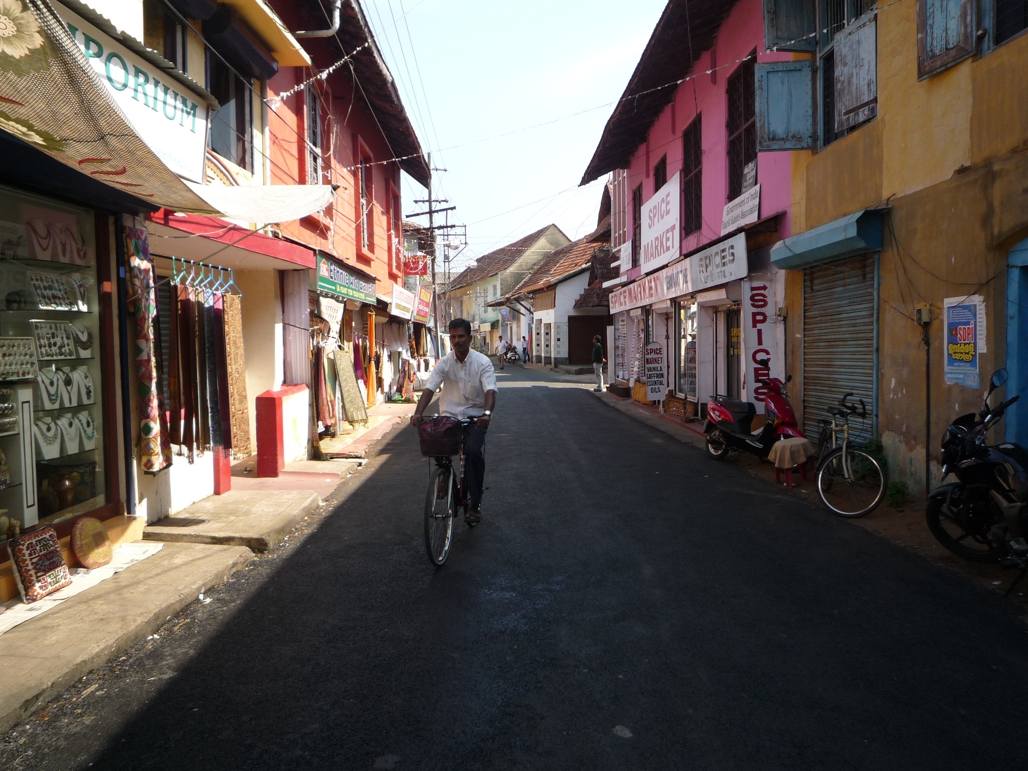 cyclist, man, ride, built structure, building exterior, india, one person, jew town, men, shopping, land vehicle, cochin, women, sleepy, 1080P, transportation, HD Wallpaper