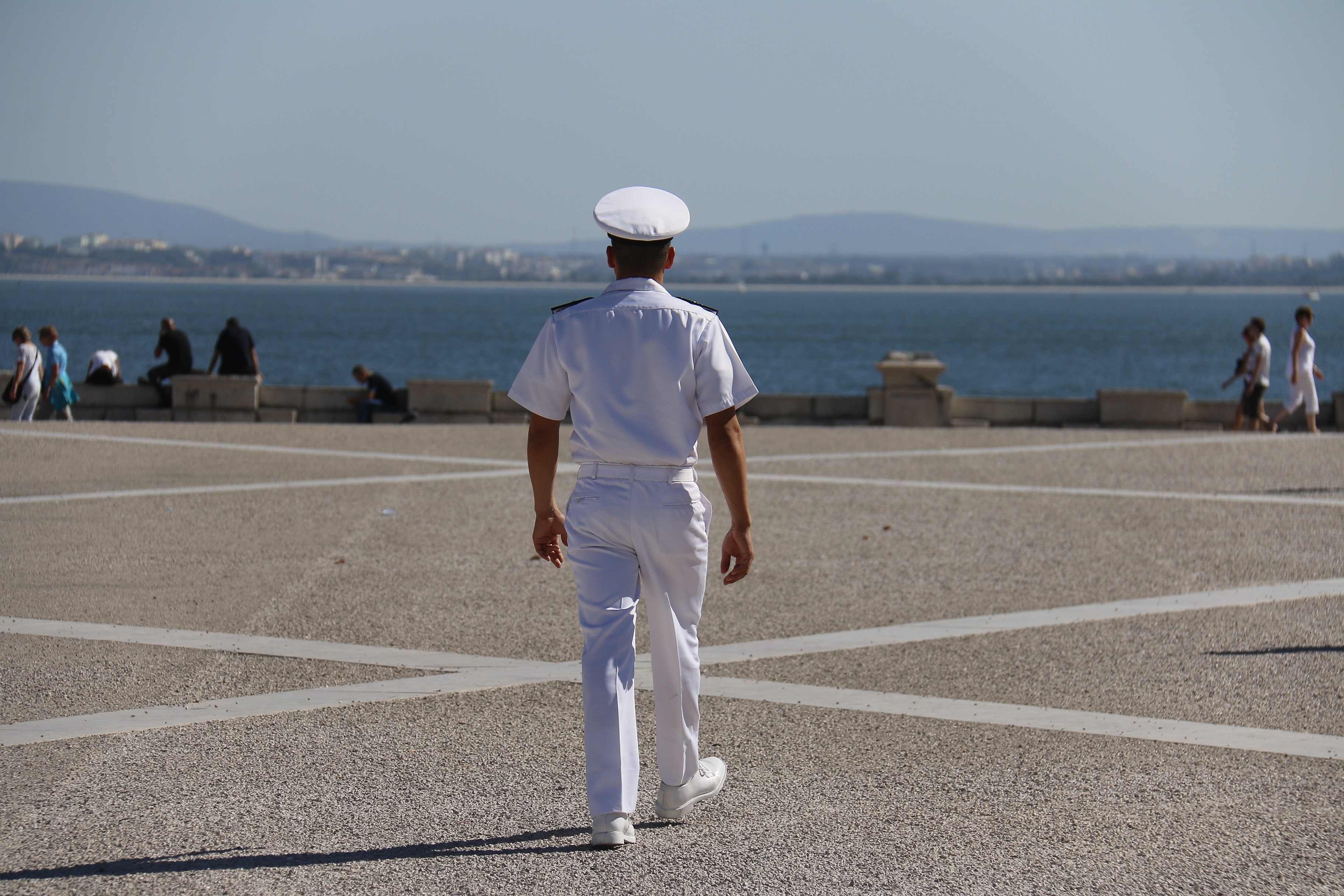 certainty, hat, one person, outdoors, real people, nature, gray, pavement, path, lifestyles, sea, man, destiny, beach, rear view, uniform, sky, people working, HD Wallpaper