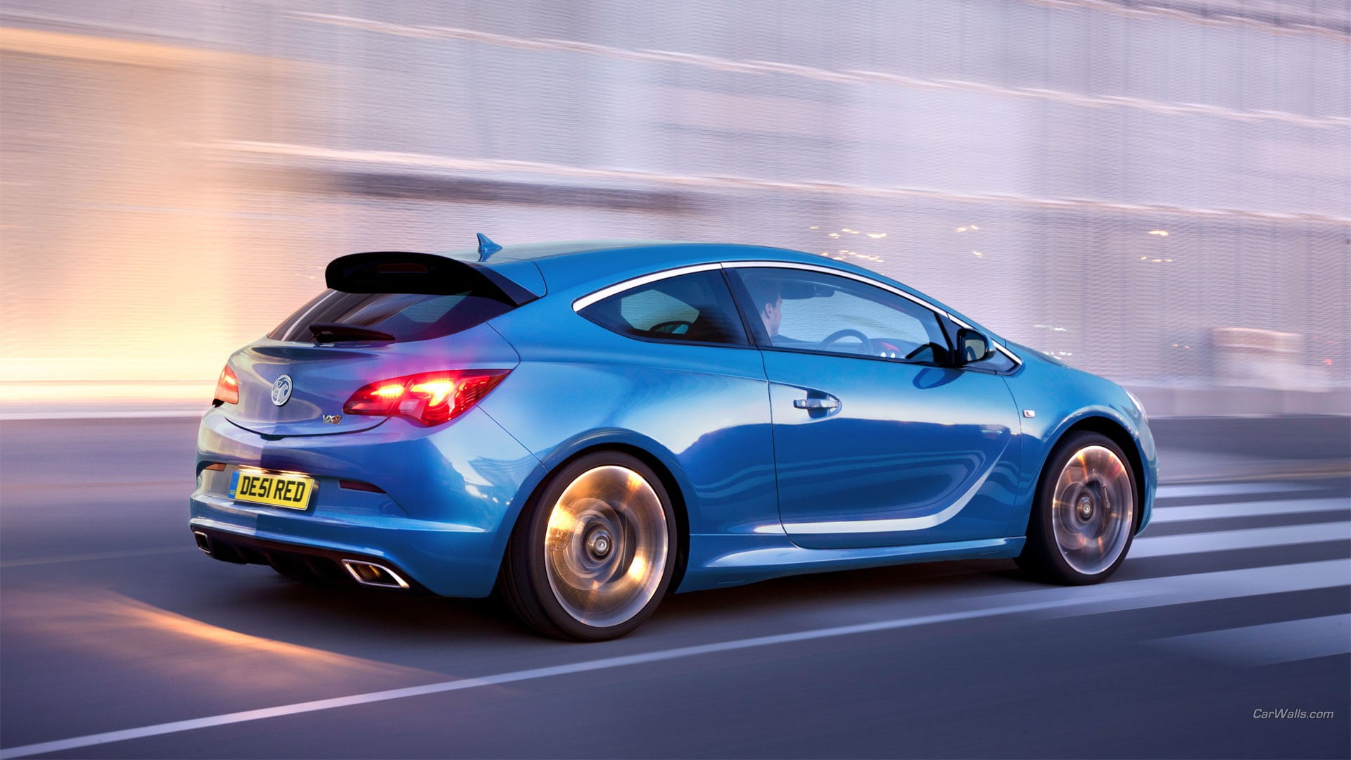 Vauxxhall Astra, car, blurred motion, street, blue, silver colored, on the move, luxury, hatchback, illuminated, 1080P, speed, blue cars, mode of transportation, HD Wallpaper
