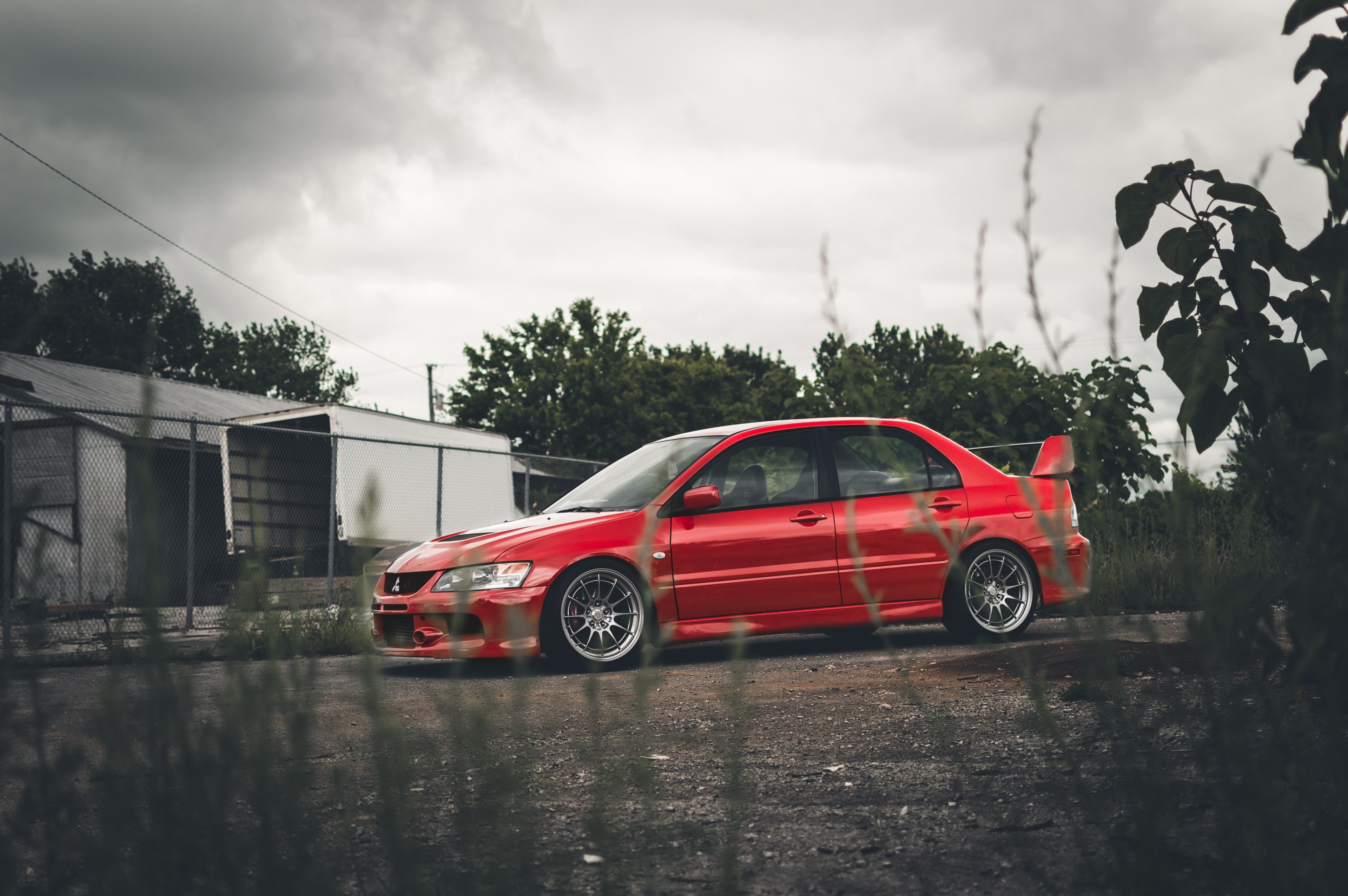 accidents and disasters, architecture, red, rainy season, no people, city, outdoors, sky, rain, 4K, nature, street, tree, land vehicle, mitsubishi lancer evolution viii 4k  for computer, HD Wallpaper