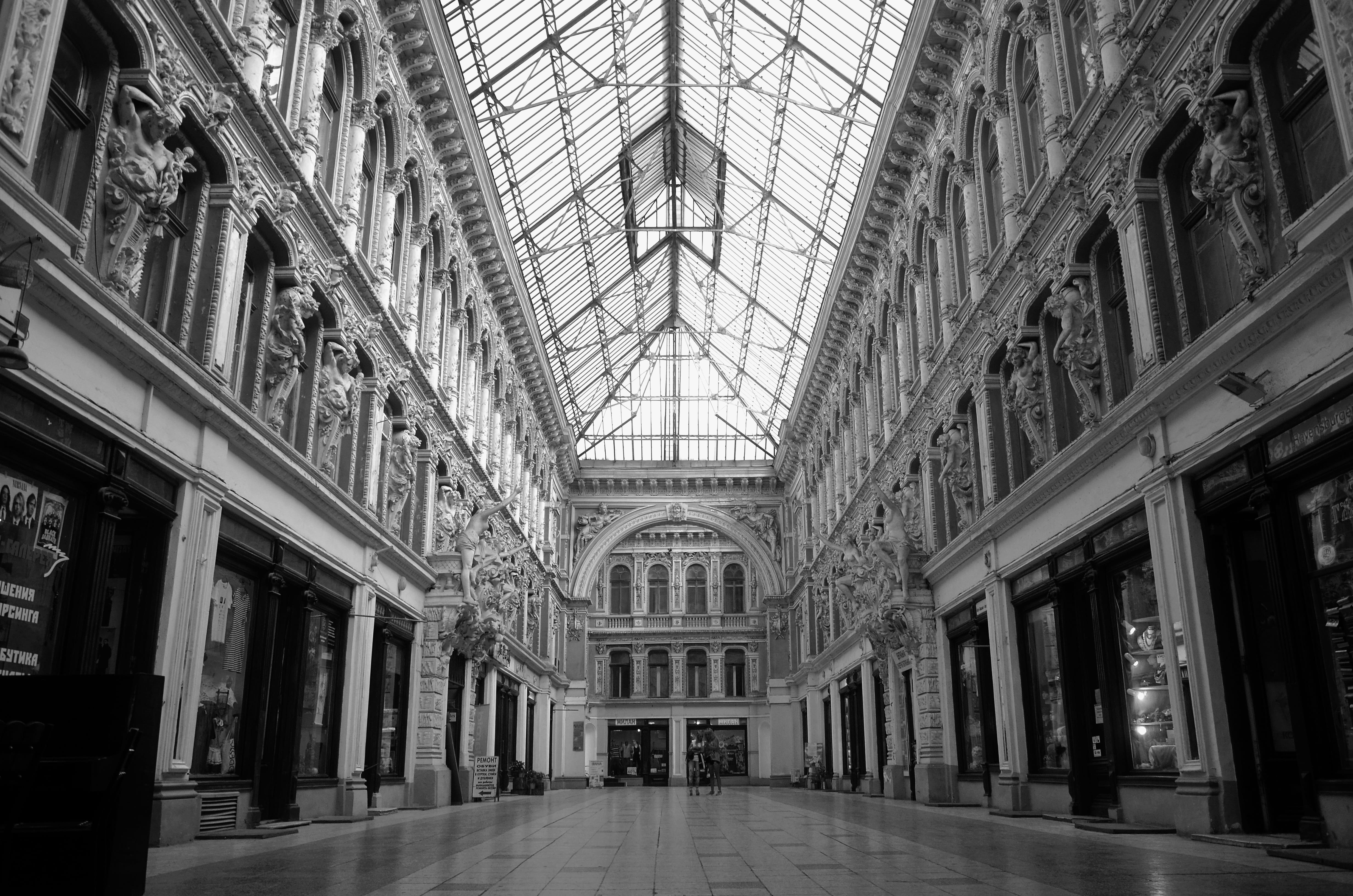 arcade, grayscale, window, glass windows, history, lane, 4K, built structure, day, buildings, arch, columns, no people, indoors, steel, tourism, building, HD Wallpaper