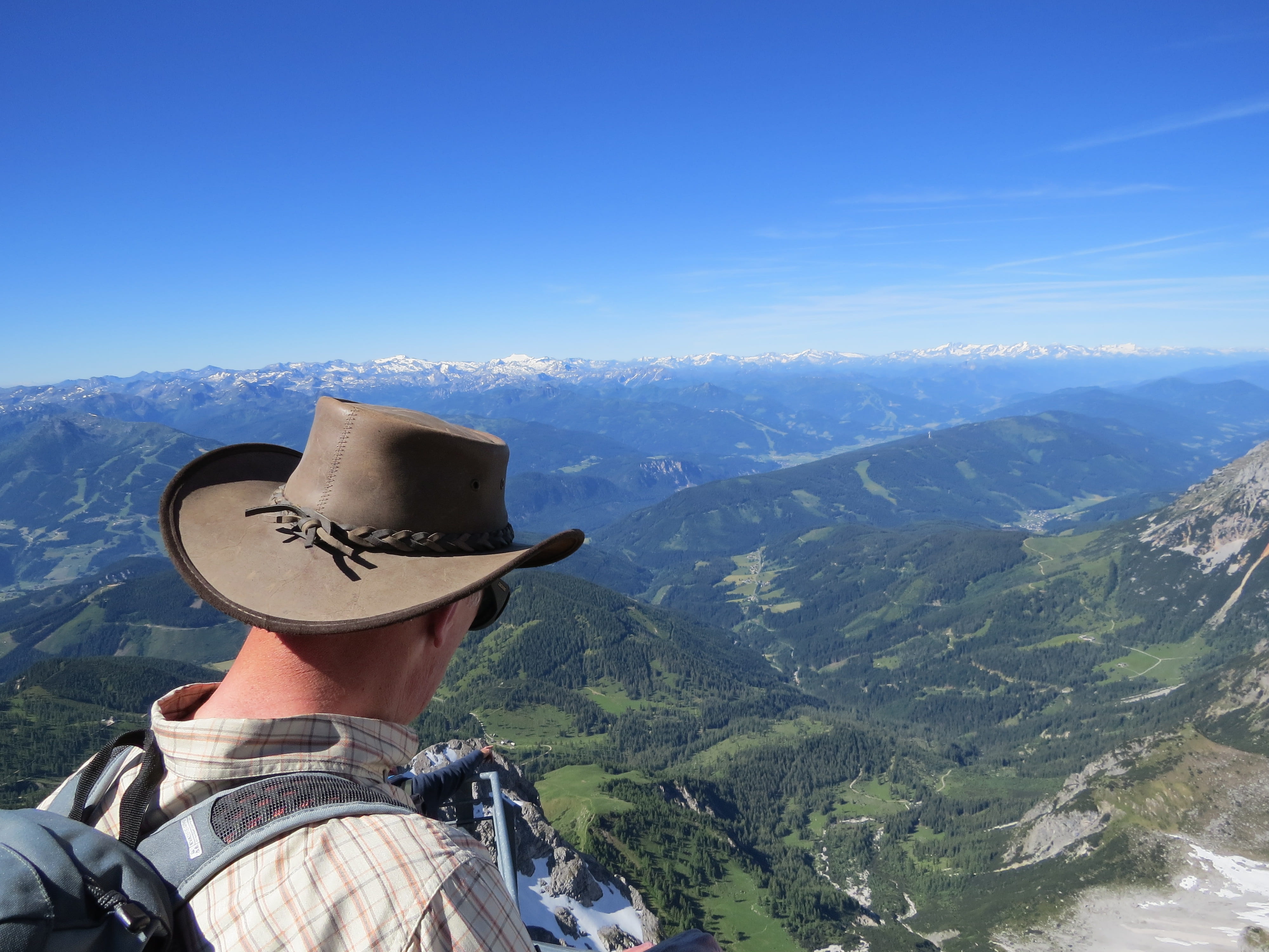 mountain range, non-urban scene, day, blue, mountain, beauty in nature, men, lifestyles, blue sky, nature, view, height, hat, rear view, real people, headshot, HD Wallpaper