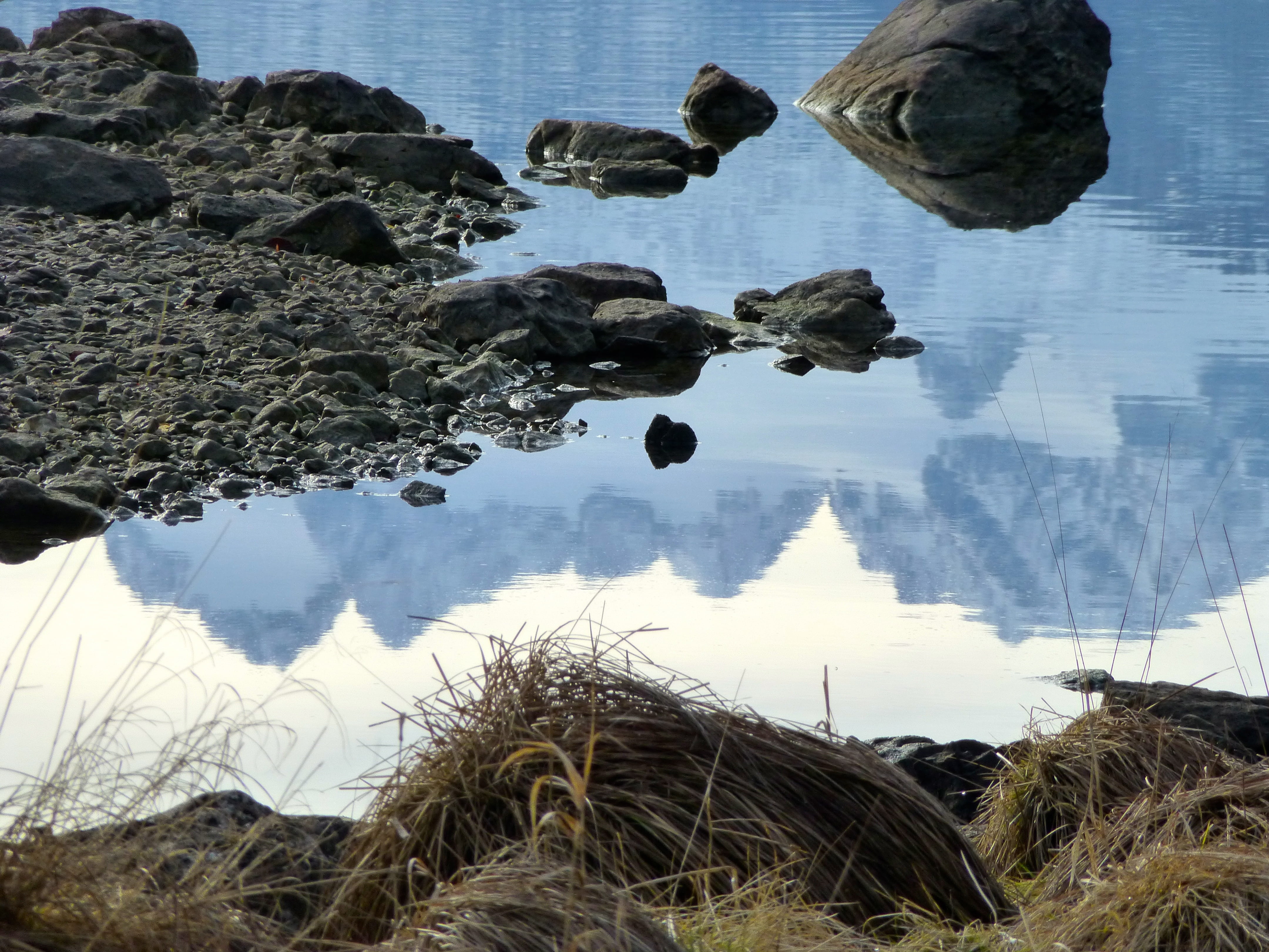 mood, beauty in nature, no people, quiet, reflection, reflections, scenics - nature, rock - object, outdoors, land, lake, panorama, grass, solid, nature, HD Wallpaper