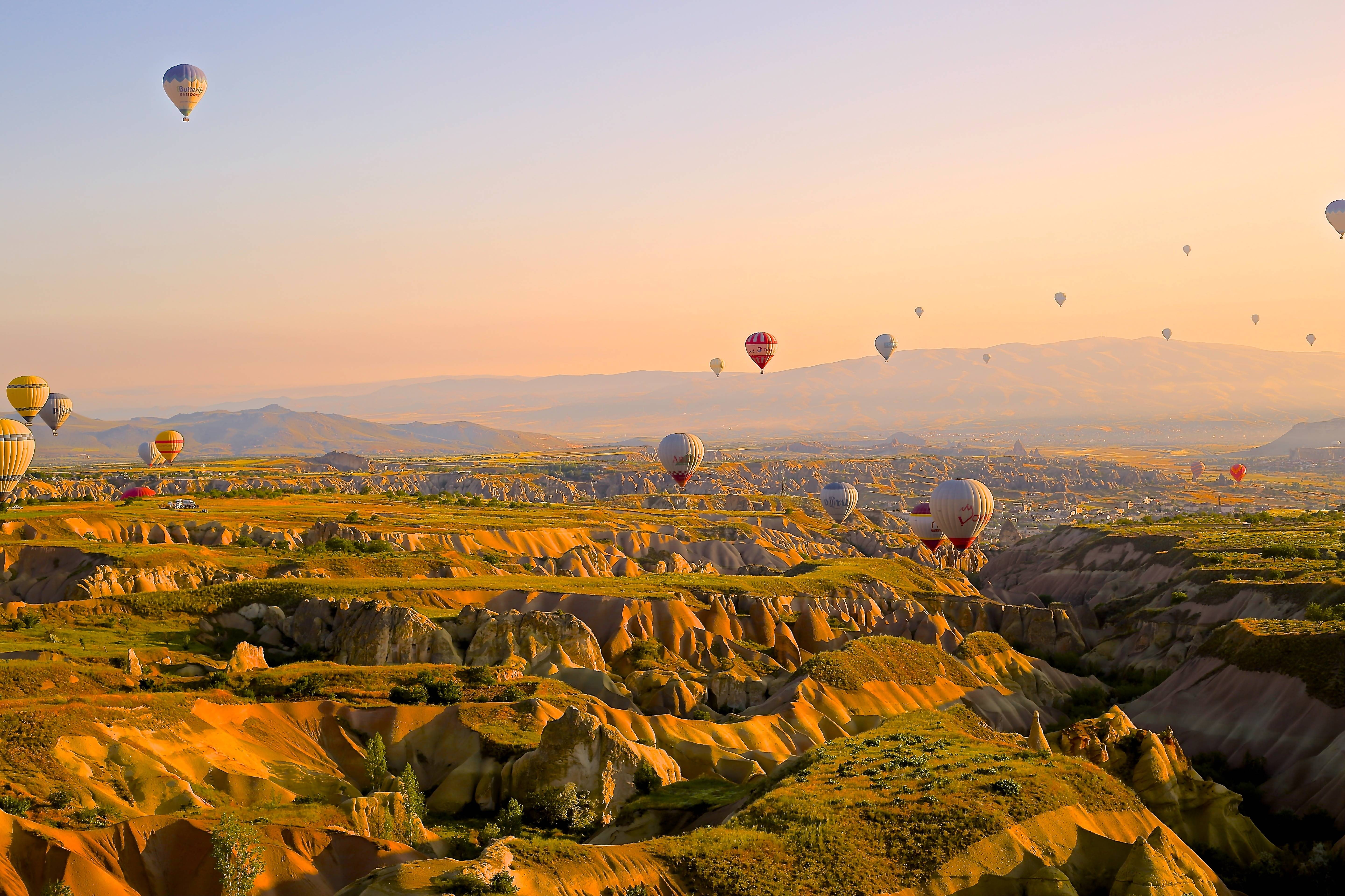 mountain, scenics - nature, sunset, ballons, non-urban scene, 5K, ballooning festival, rock - object, hot air balloon, valley, environment, travel destinations, HD Wallpaper
