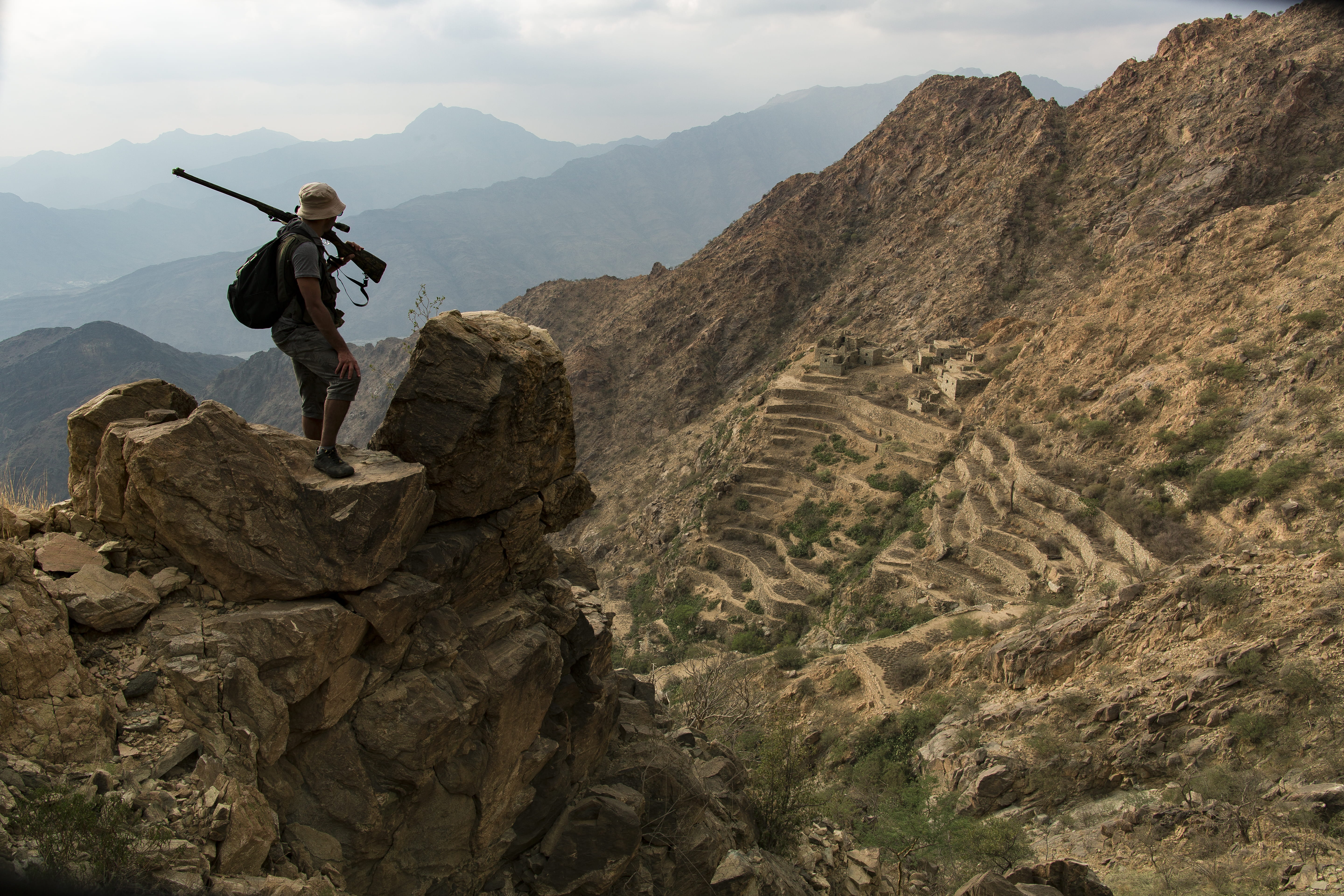 al bahah, rock, day, mountains, nature, casual clothing, standing, outdoors, 5K, solid, adventure, real people, rock formation, saudi arabia, albaha, lifestyles, HD Wallpaper